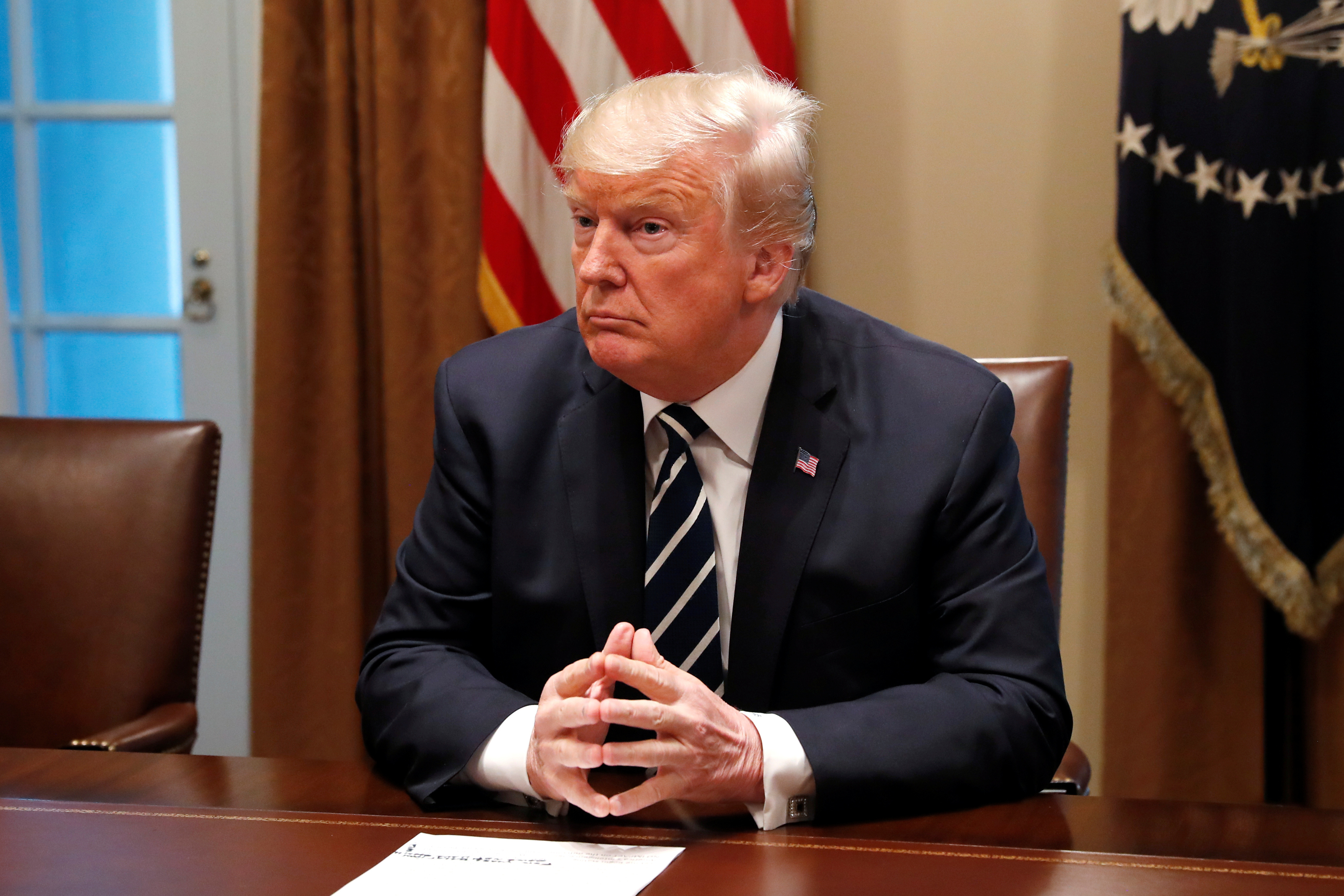 President Trump told reporters on Tuesday that he has &quot;full faith and support for America's great intelligence agencies.&quot; (Reuters)