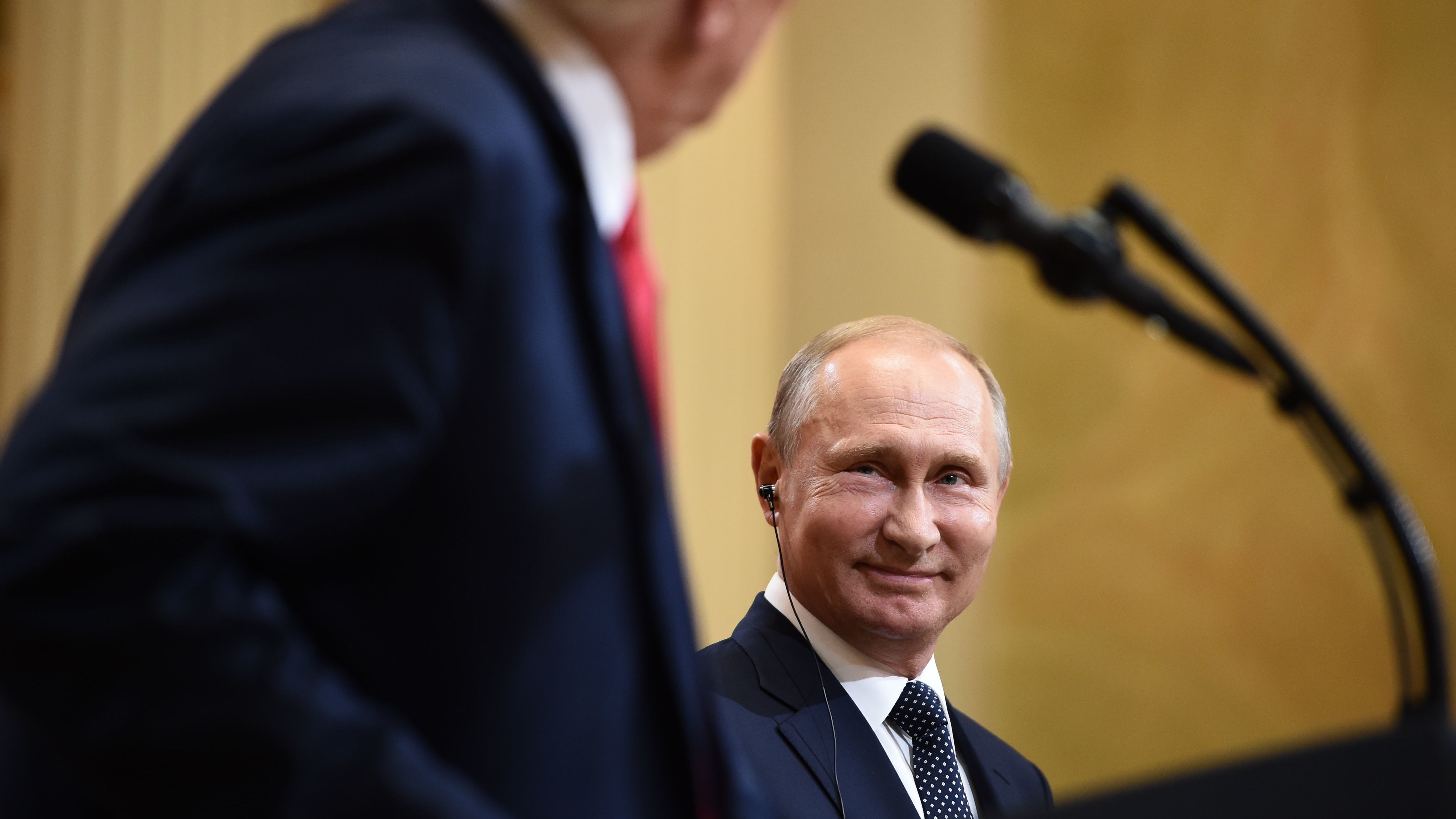 Russia's President Vladimir Putin Putin suggested to President Trump in their one-on-one meeting in Helsinki on Monday that Trump allow Russian investigators to come to the U.S. to question a former ambassador in exchange for Putin allowing U.S. investigators to travel to Russia to question 12 recently indicted military intelligence officers. (AFP/Getty Images)