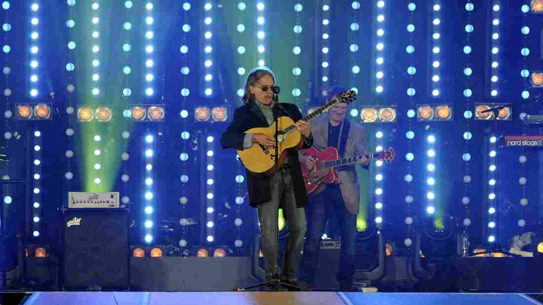 Scottish singer Dougie MacLean performs during the 2014 Commonwealth Games at Hampden Park in Glasgow, Scotland, in August 2014.