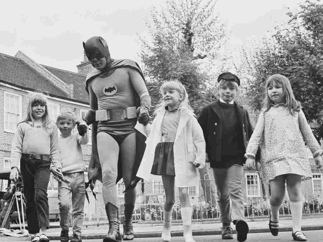 Adam West brings out his alter ego, Batman, for the filming of a 1967 road safety ad for children.
