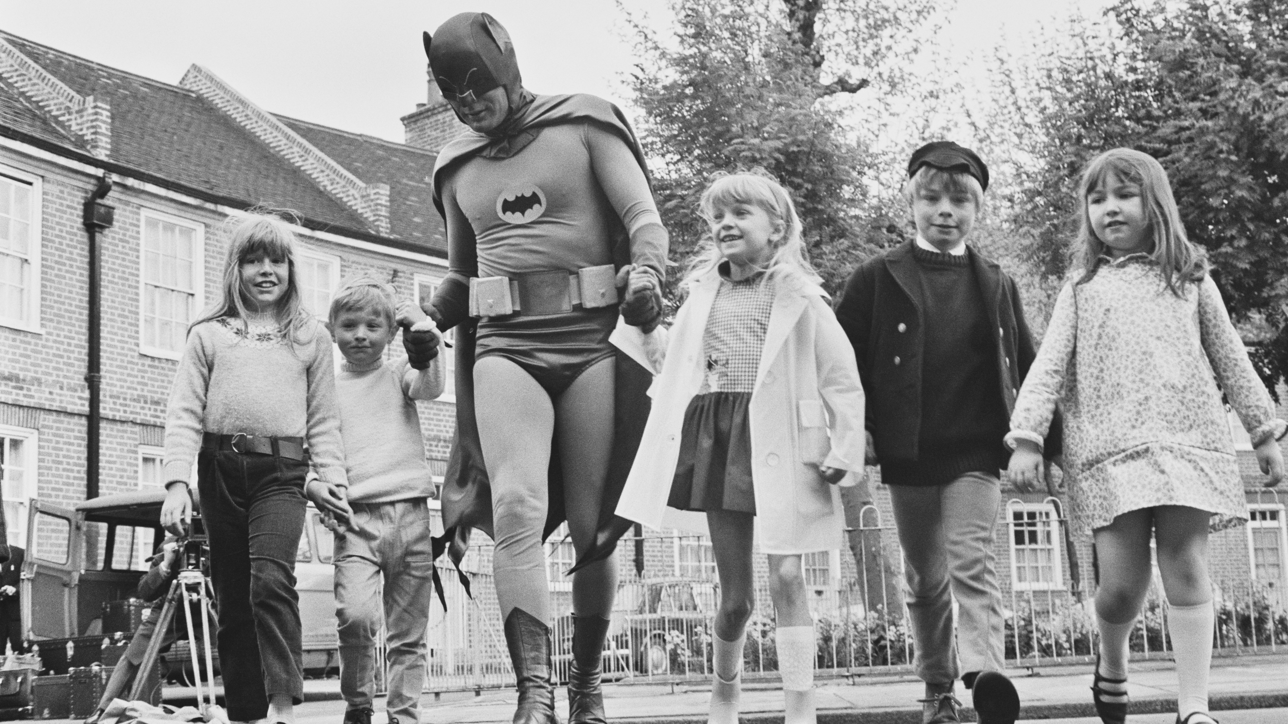 Adam West brings out his alter ego, Batman, for the filming of a 1967 road safety ad for children.