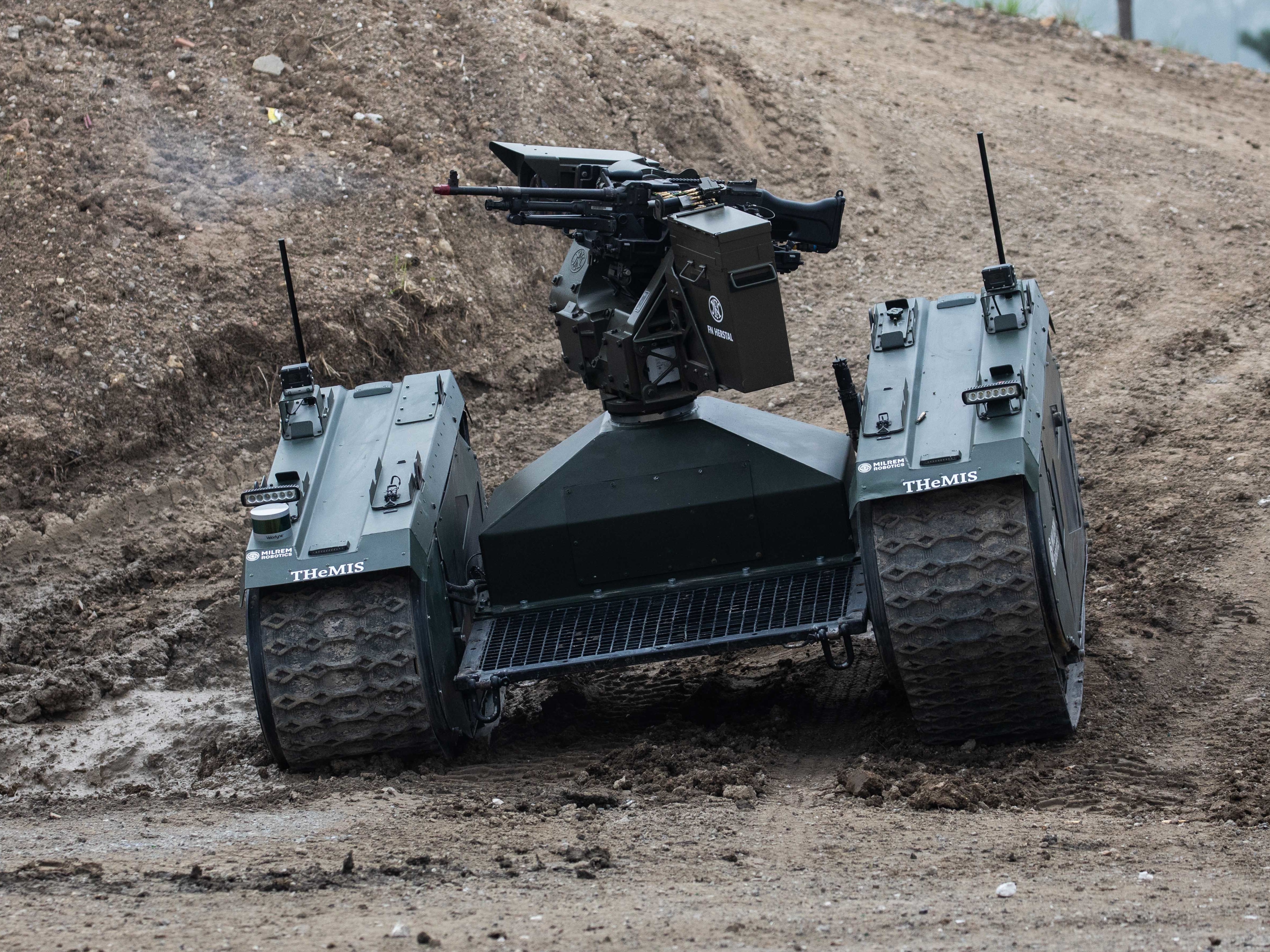 An autonomous tank is demonstrated in France last month. Leading researchers in artificial intelligence are calling for laws against lethal autonomous weapons. They also pledge not to work on such weapons. (Getty Images)