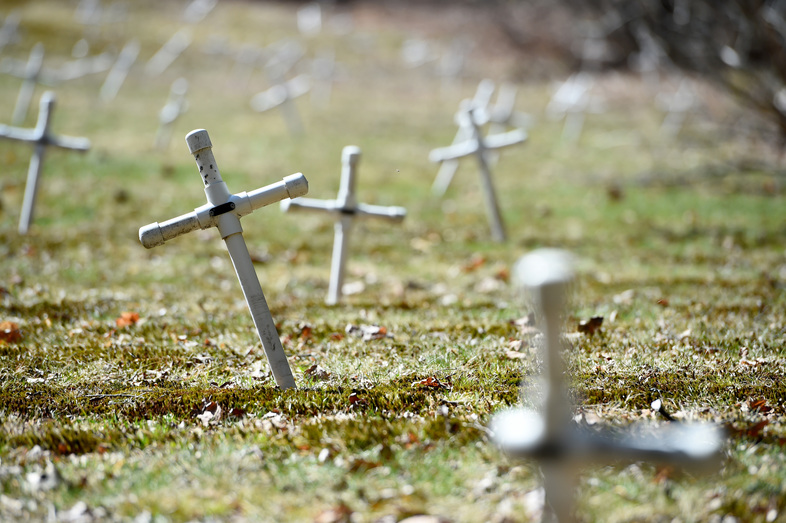 Nearly 90 former inmates are buried here on the grounds of the North Central Correctional Institution at Gardner. Before inmates, the state buried patients housed at what once was the Gardner State Colony for the "mentally disturbed." (Meredith Nierman/WGBH)