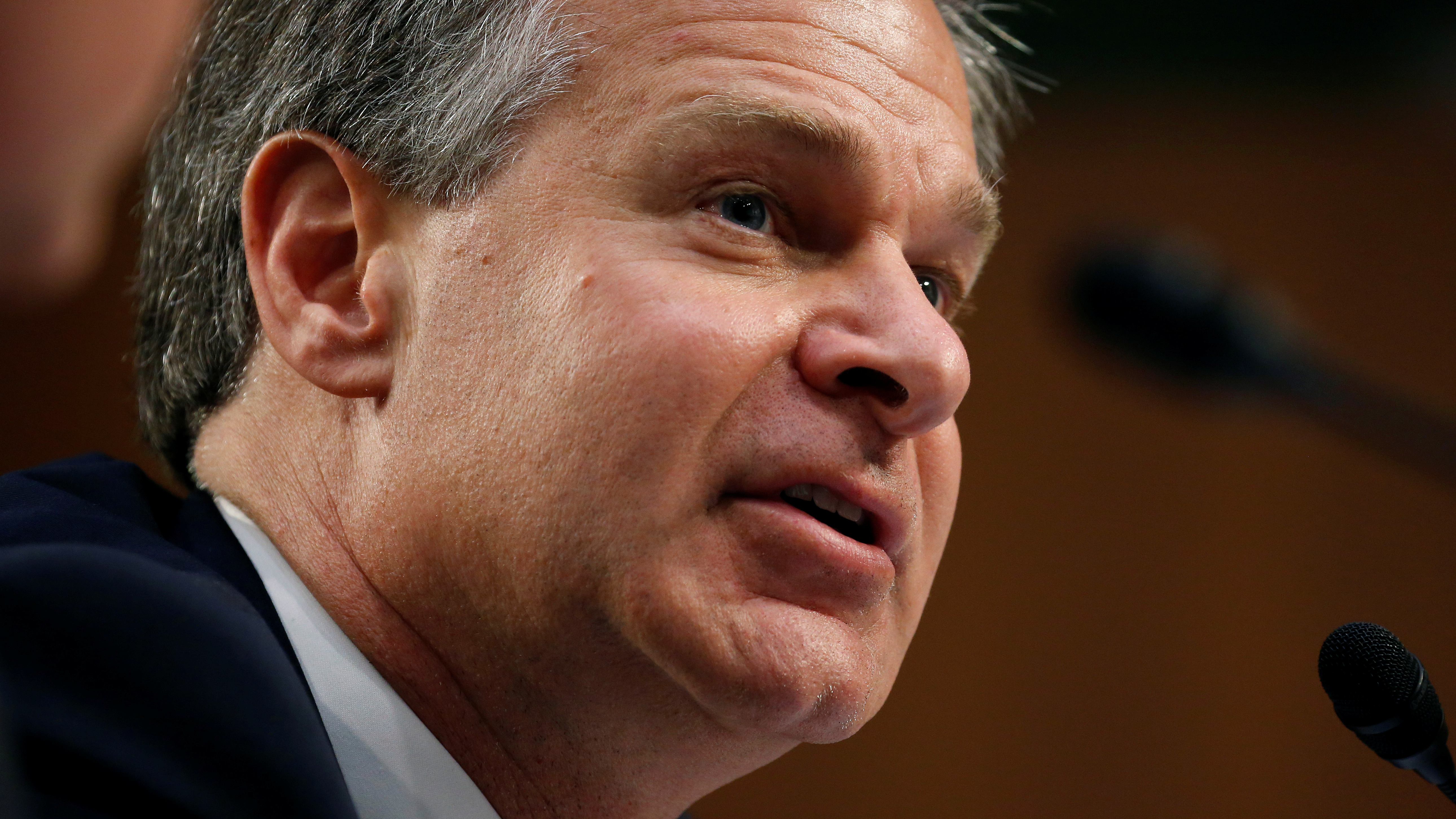 FBI Director Christopher Wray testifies on Capitol Hill on June 18. (Reuters)