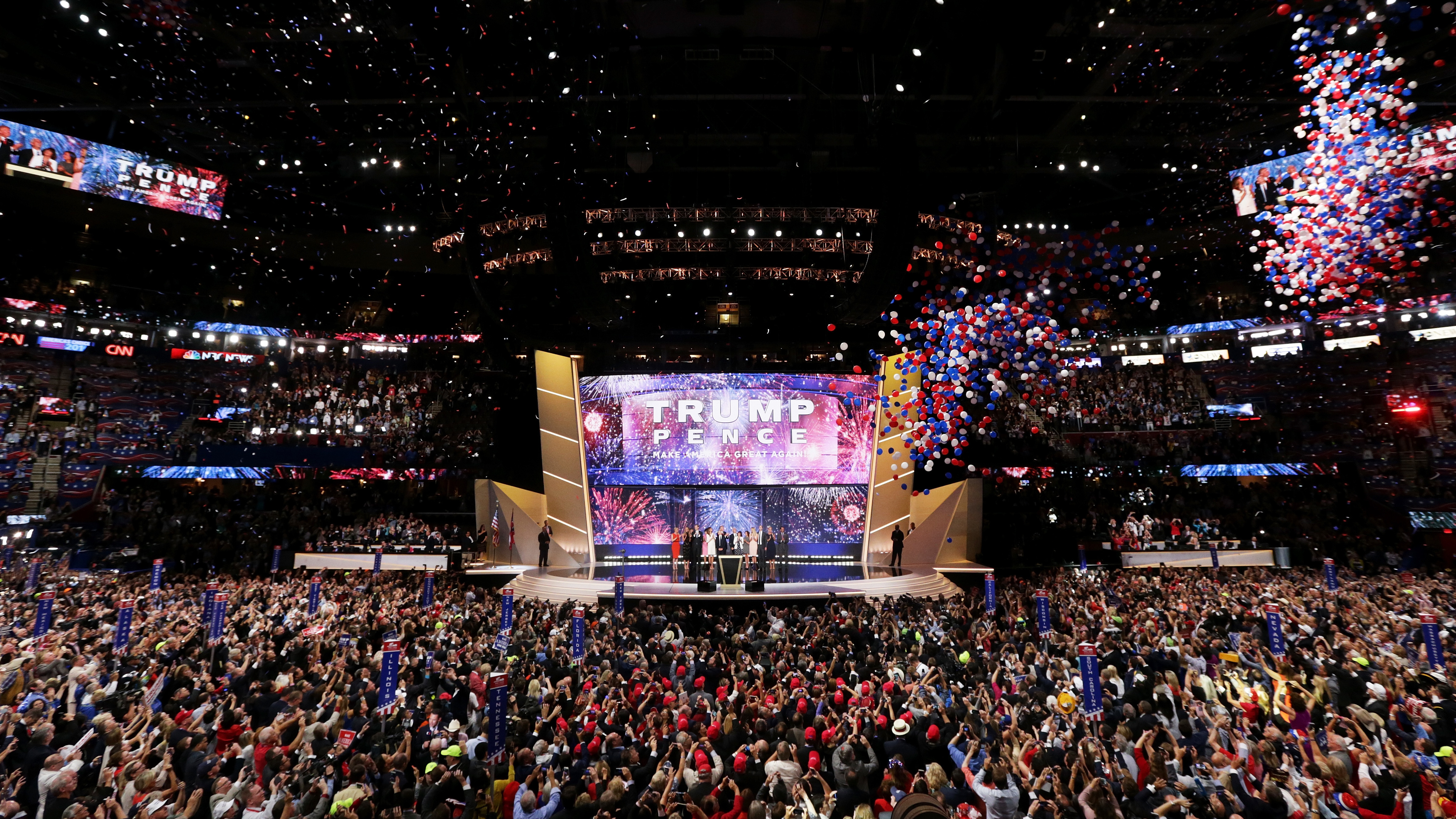 Then-candidate Donald Trump onstage with his running mate, Mike Pence, and their families at the end of the 2016 Republican National Convention in Cleveland. Republicans have chosen Charlotte, N.C., a city that hosted Democrats' convention in 2012, to host their 2020 convention. (Getty Images)