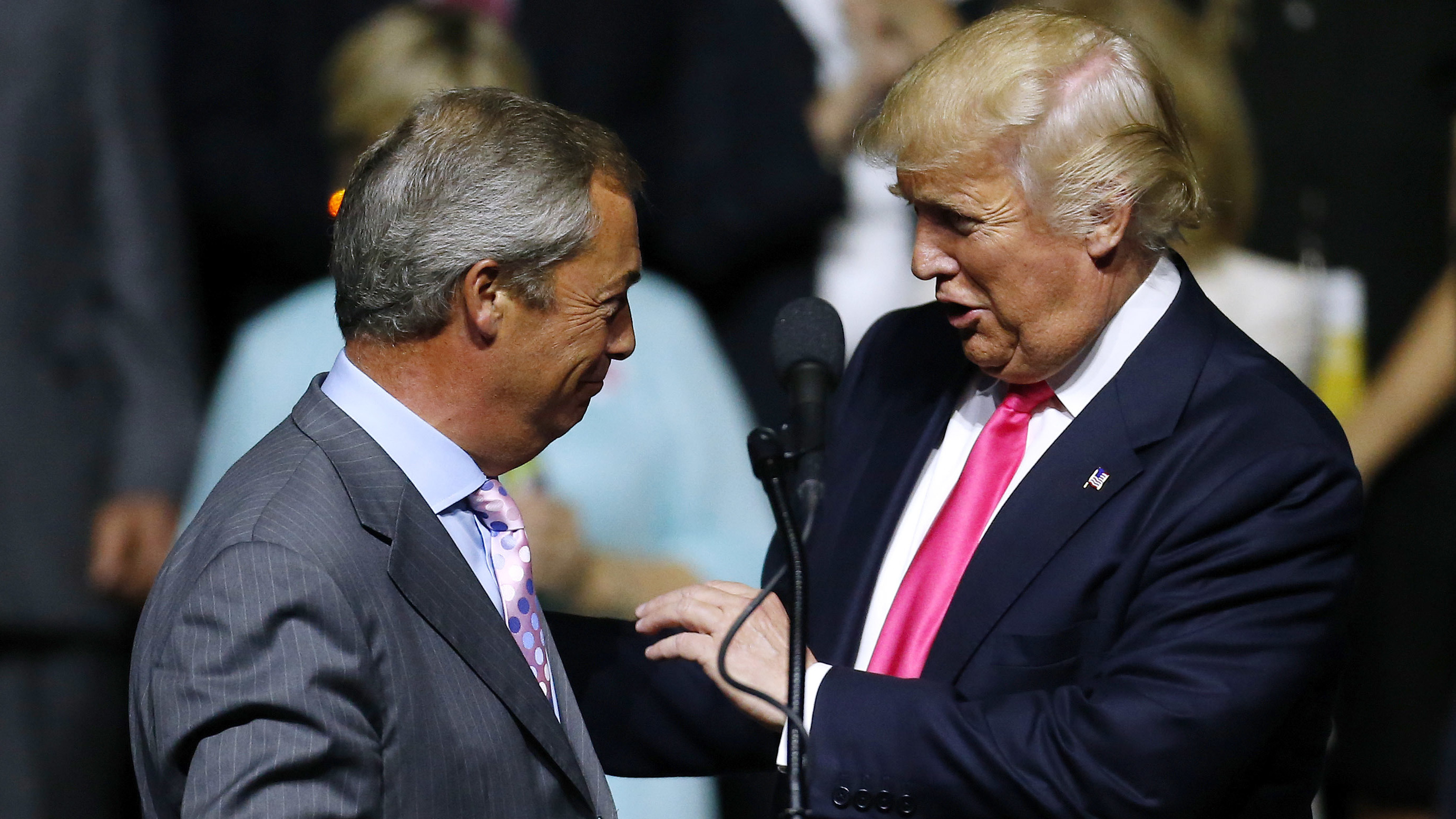 Republican presidential nominee Donald Trump greets British politician Nigel Farage during a campaign rally in Jackson, Miss., on Aug. 24, 2016. Journalist Carole Cadwalladr says &quot;there are so many overlaps&quot; between Russia, the Trump campaign and the Brexit vote. (Getty Images)