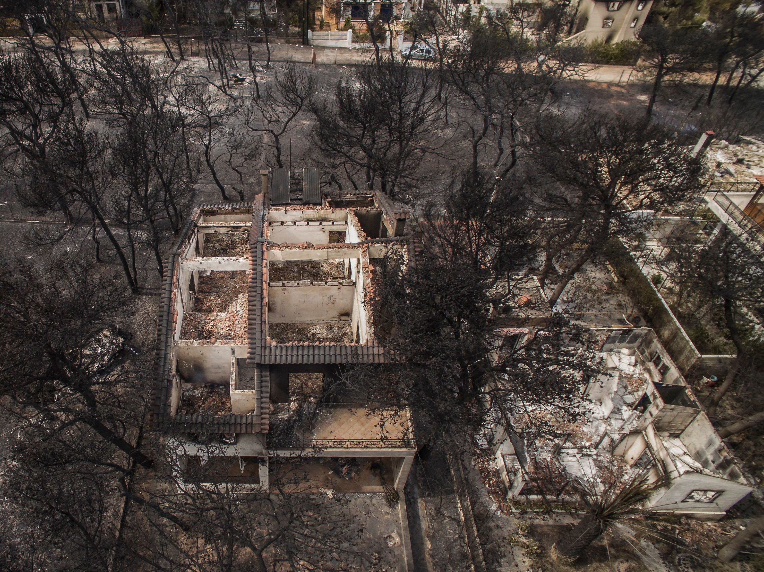 Scores dead in Greece as wildfires engulf Attica region