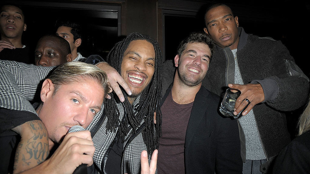 Billy McFarland (second from right), photographed with (L-R) promoter Matthew Asante and musicians Waka Flocka and Ja Rule in Manhattan in 2016.