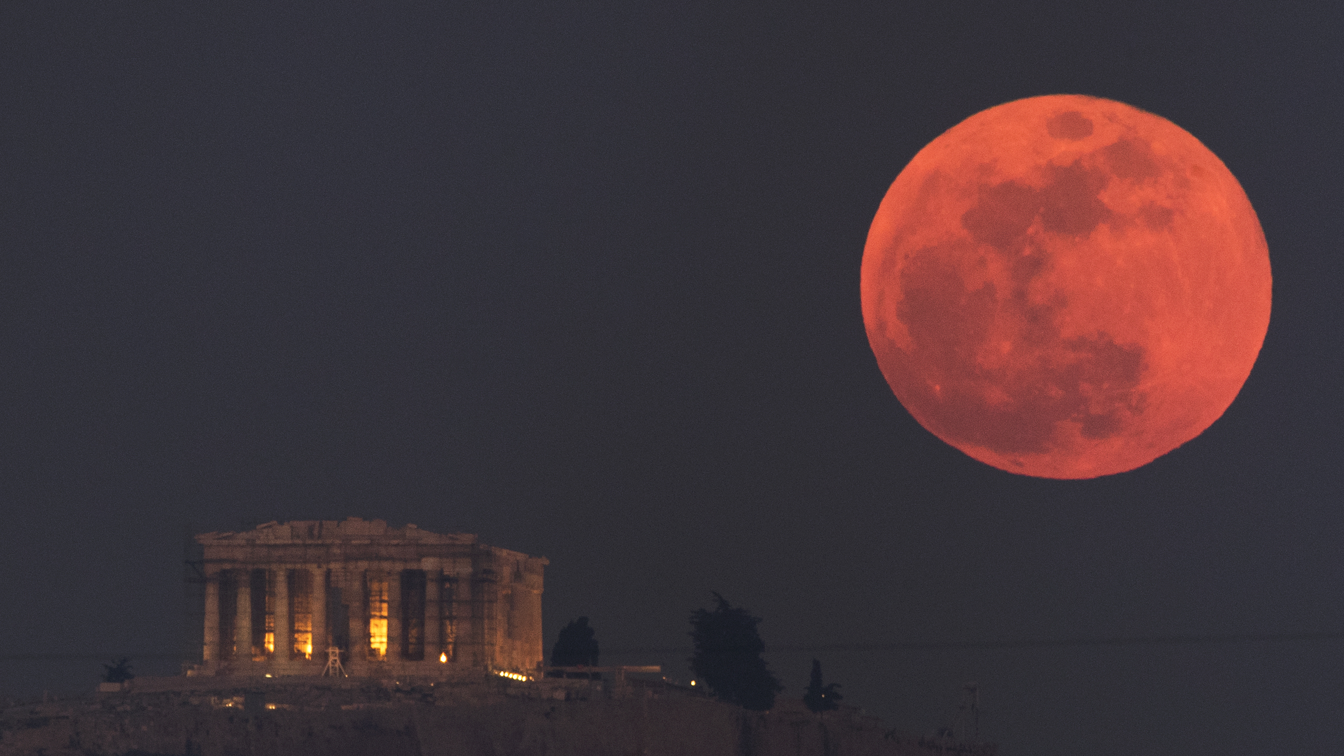 The moon is expected to appear red or orange, as it did during the lunar eclipse in January.