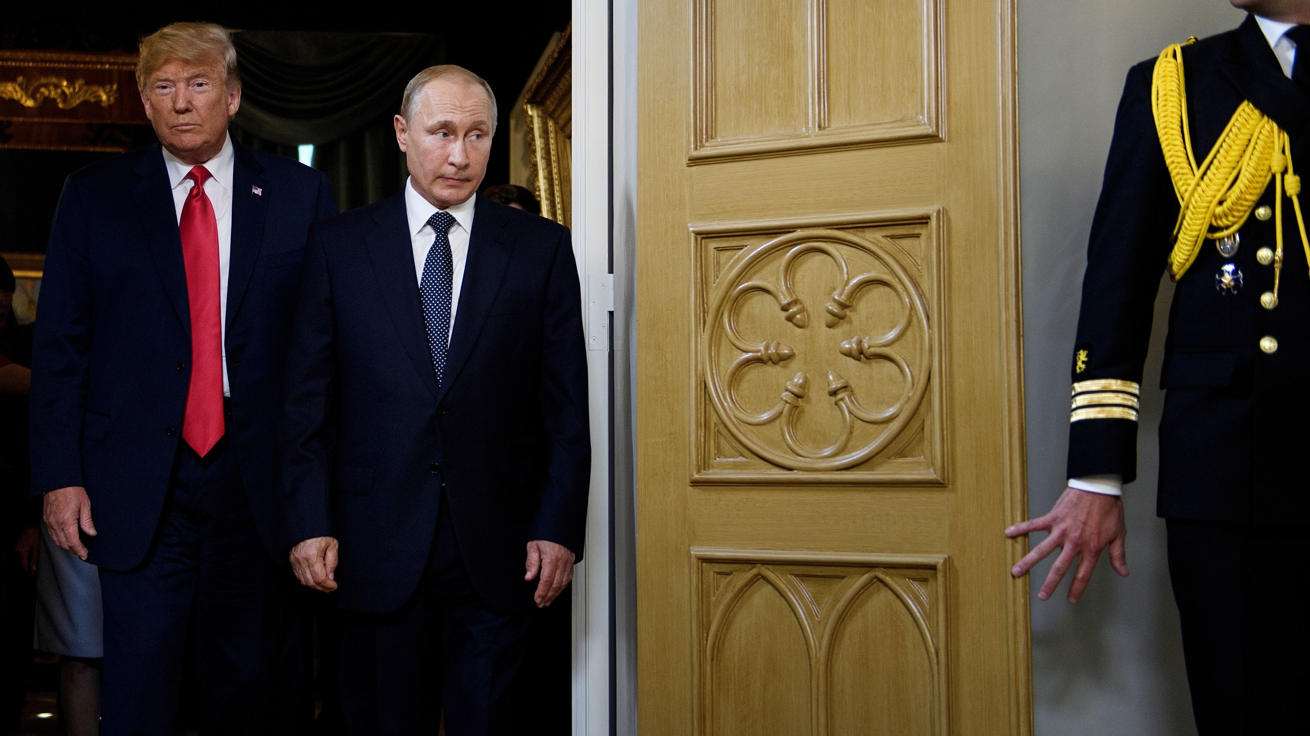 President Trump and Russian President Vladimir Putin met in Helsinki on July 16. The White House said last week that Trump had invited Putin to the U.S. in the fall but said Wednesday that the visit will be postponed. (AFP/Getty Images)