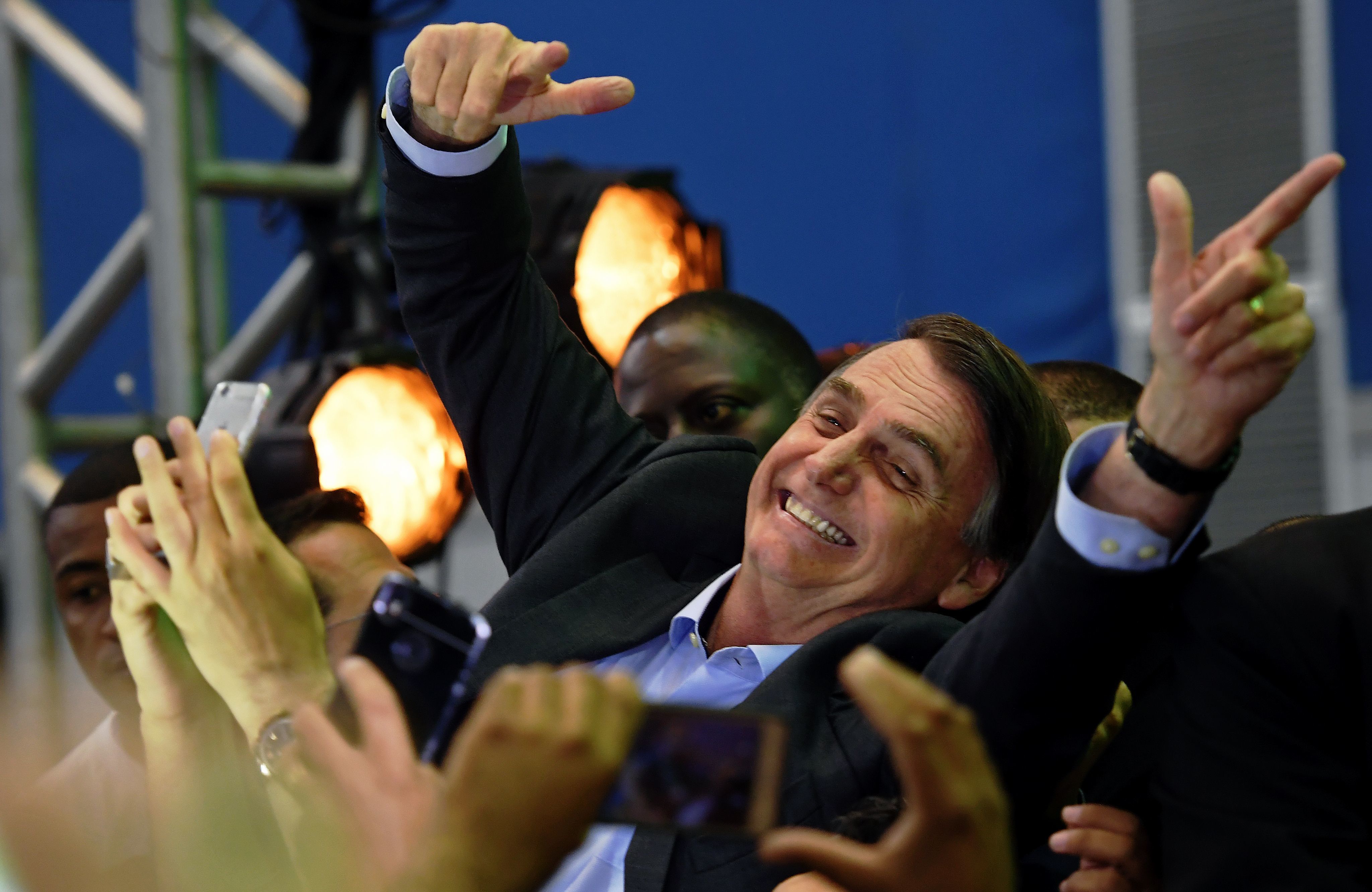 Brazilian lawmaker Jair Bolsonaro is greeted by supporters as he launches his campaign for October's presidential election, in Rio de Janeiro, on July 22. (Carl De Souza/AFP/Getty Images)