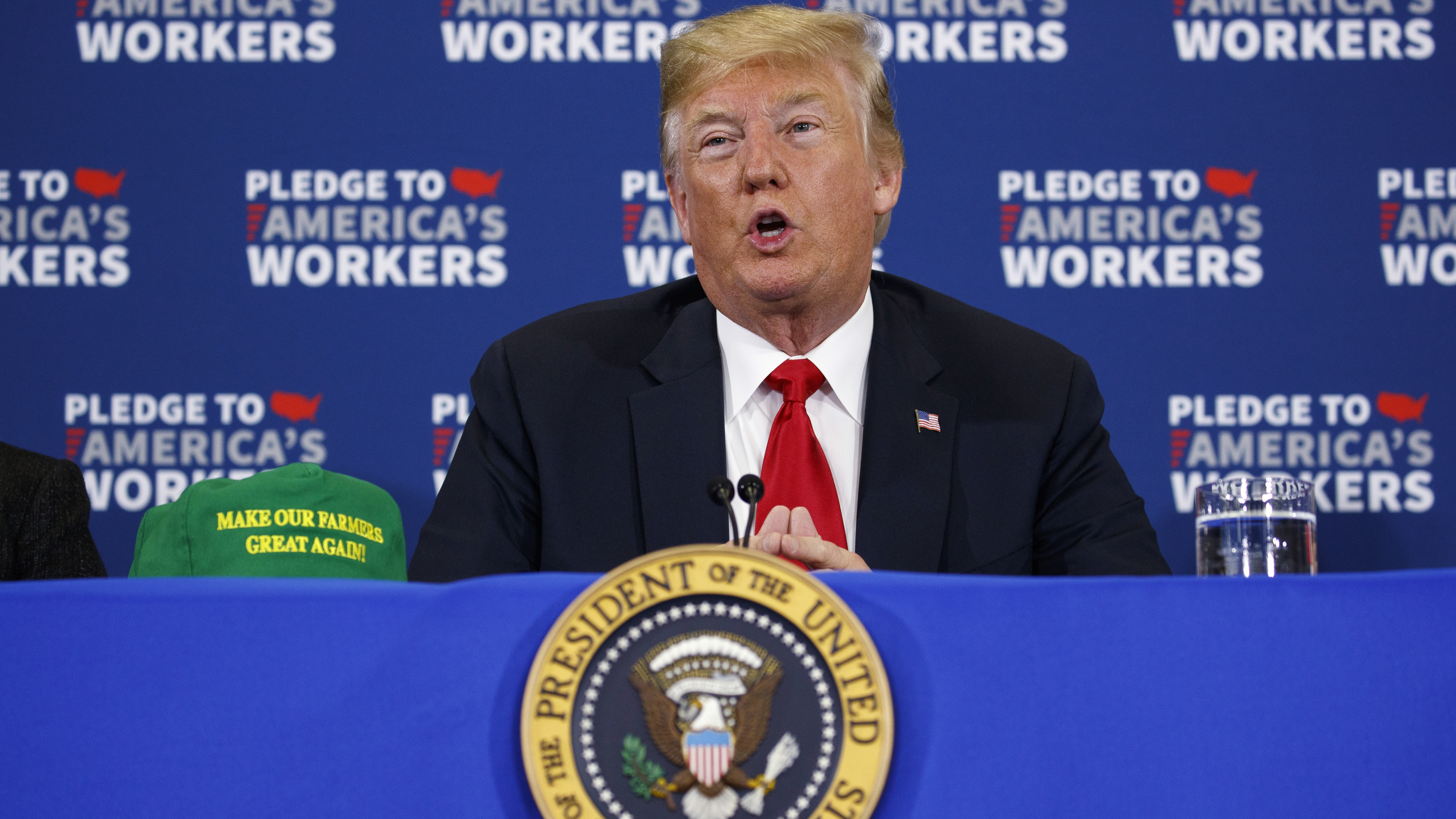 President Trump speaks in Iowa, which has been hit hard by tariffs from other countries issued in retaliation to Trump's tariffs. Trump brought with him new "Make Our Farmers Great Again!" hats.