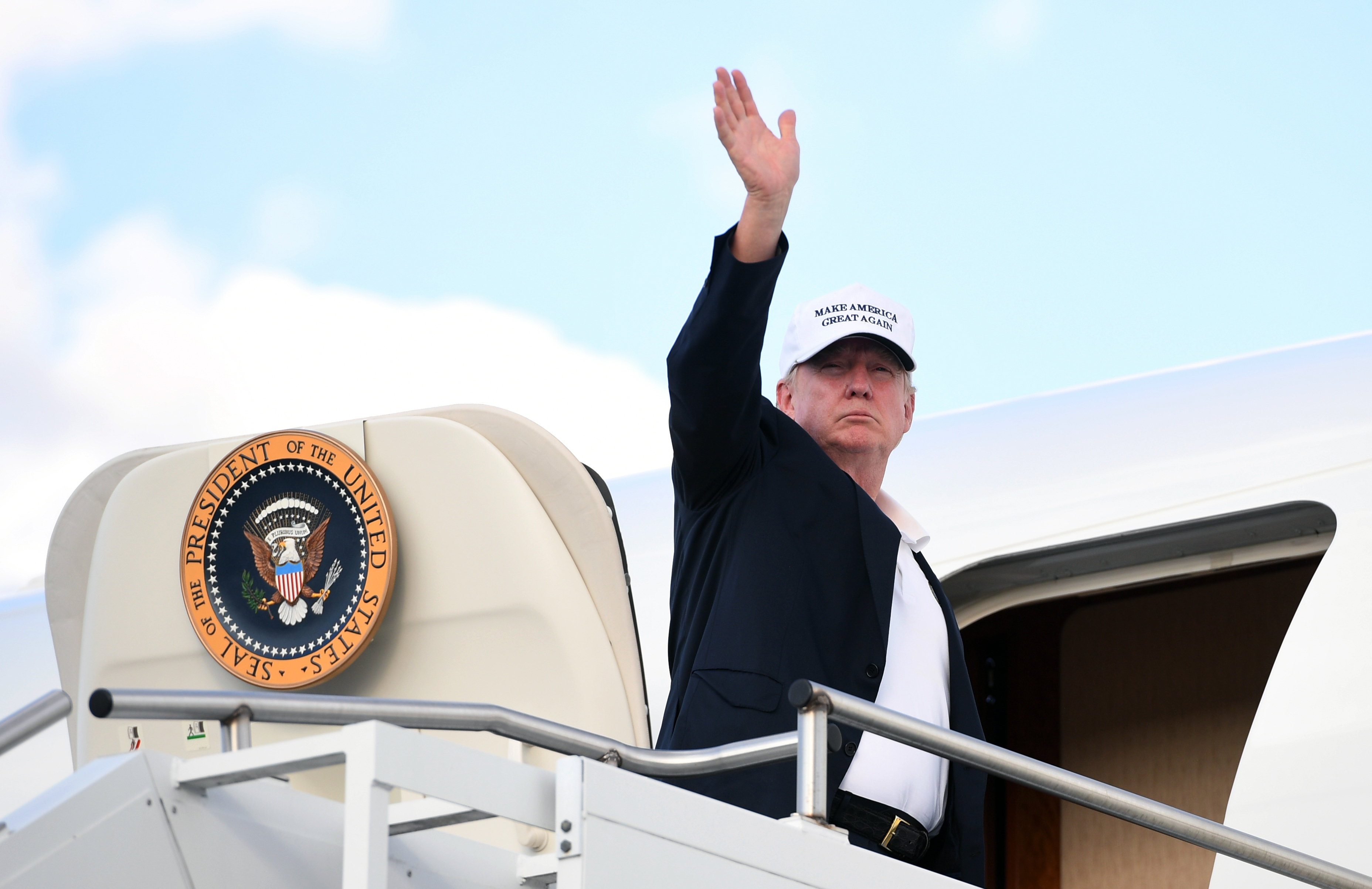 President Trump boards Air Force One after spending the weekend at Trump National Golf Club in Bedminster, N.J. before heading back to Washington. (AFP/Getty Images)