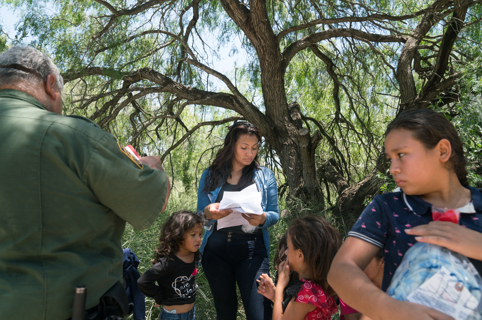 Dahani Gudiel, 25, from Guatemala turned herself and her three daughters in to the U.S. Customs and Border Protection outside of McAllen, Texas on Monday. Gudiel says she crossed the border seeking asylum after being threatened by gangs at home. (Claire Harbage/NPR)