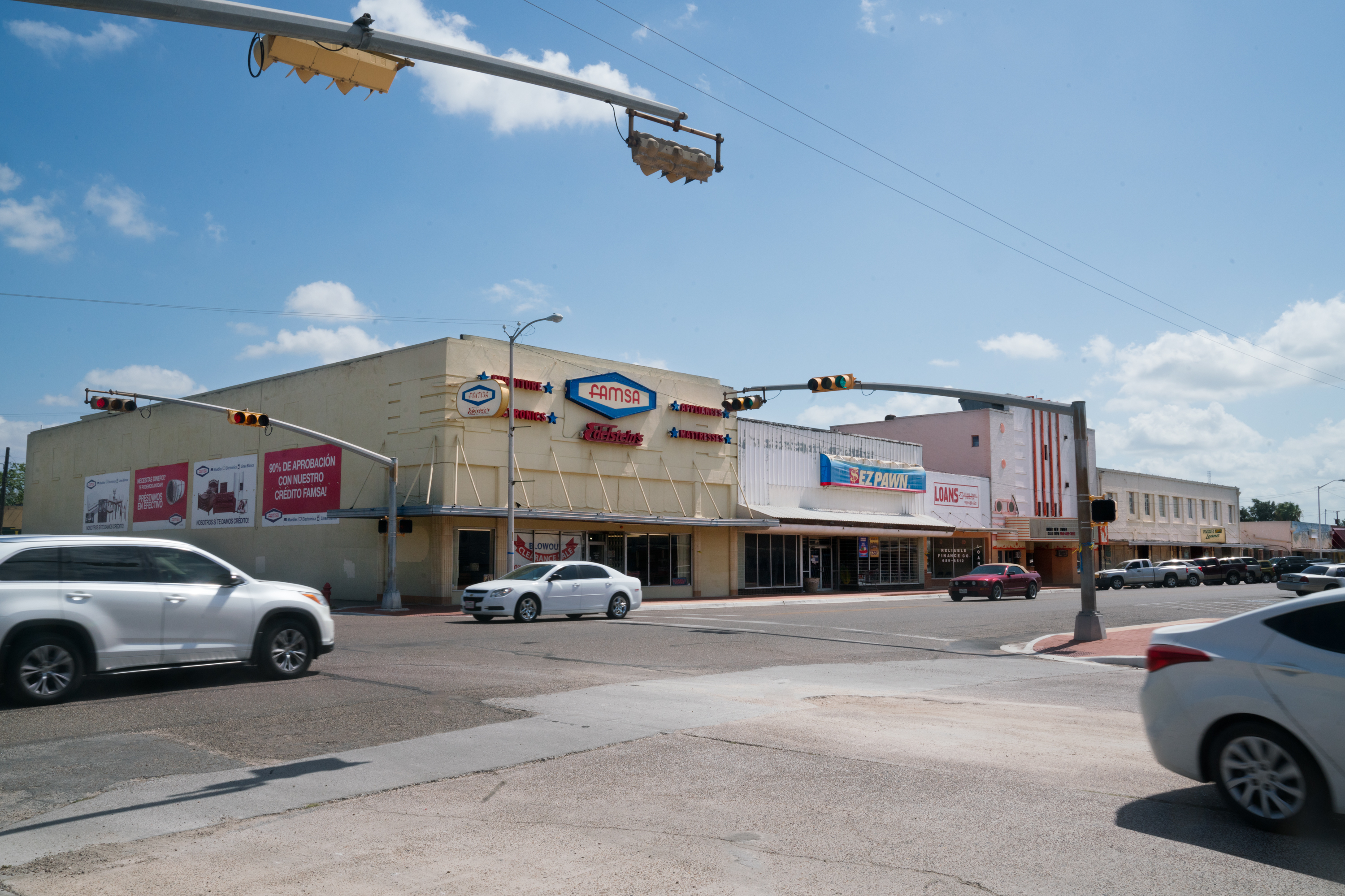 In once-bustling Raymondville, Texas, many businesses — from a historic movie theater to a Walmart — are no longer open. (NPR)