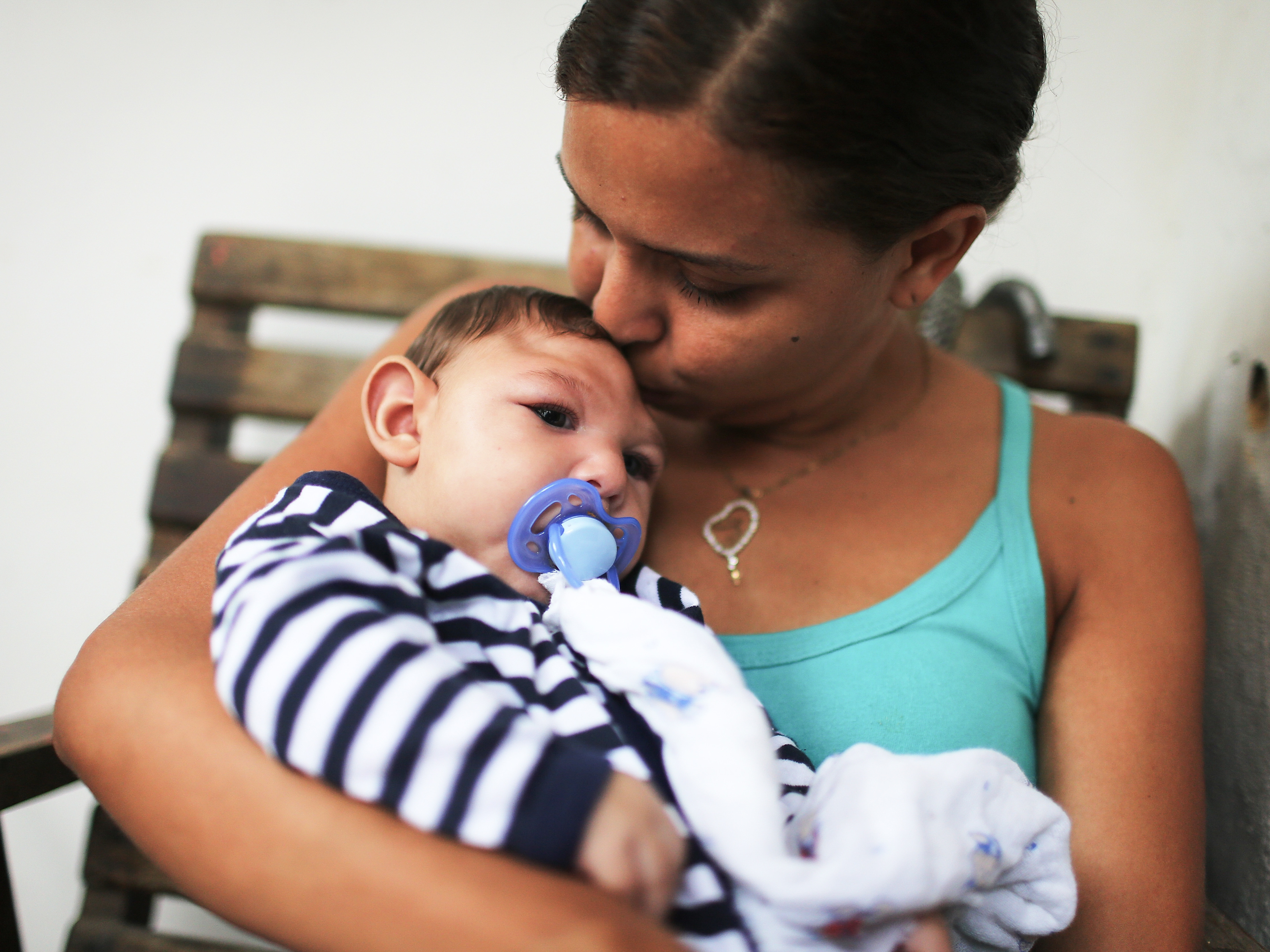 Mother Daniele Santos holds her baby Juan Pedro, who has microcephaly, on May 30, 2016, in Recife, Brazil. Researchers are now learning that Zika's effects can appear up to a year after birth. (Getty Images)