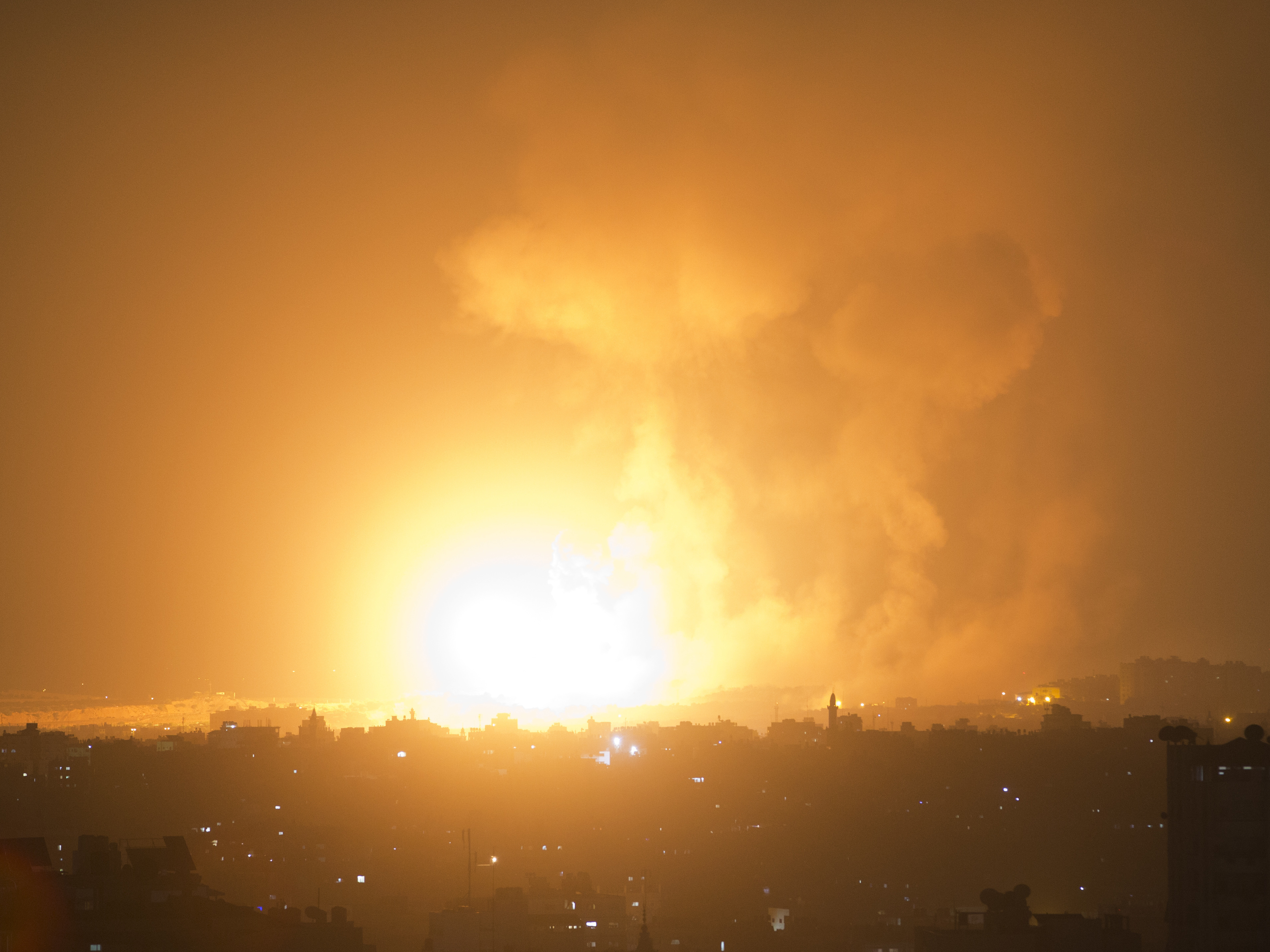 An explosion caused by an Israeli airstrike on Gaza City early Thursday.