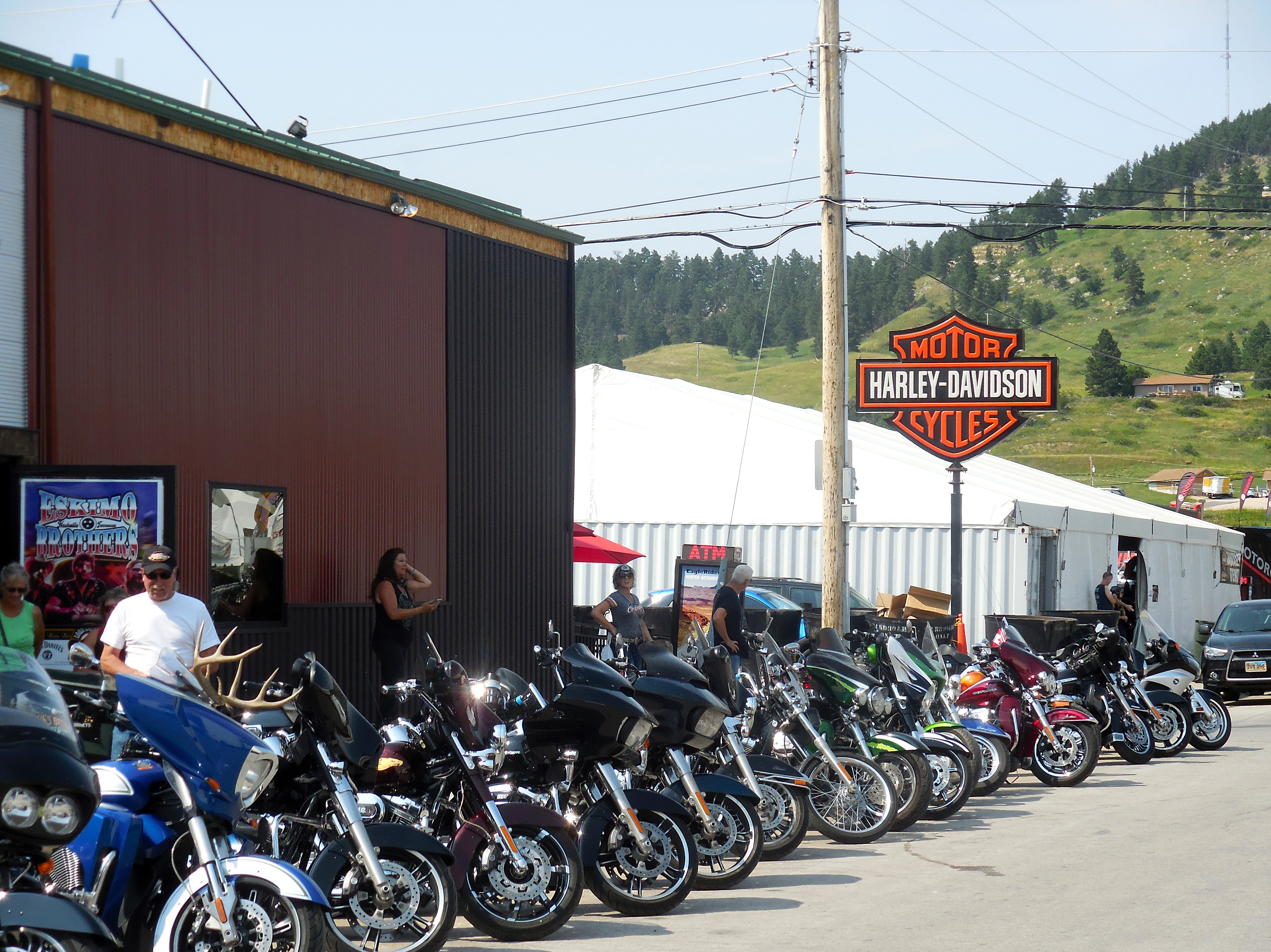 The streets of Sturgis may be quieter than they once were, especially during rally anniversary years, but there are still plenty of bikers who come to visit the vendors and local businesses. (Jim Kent for NPR)