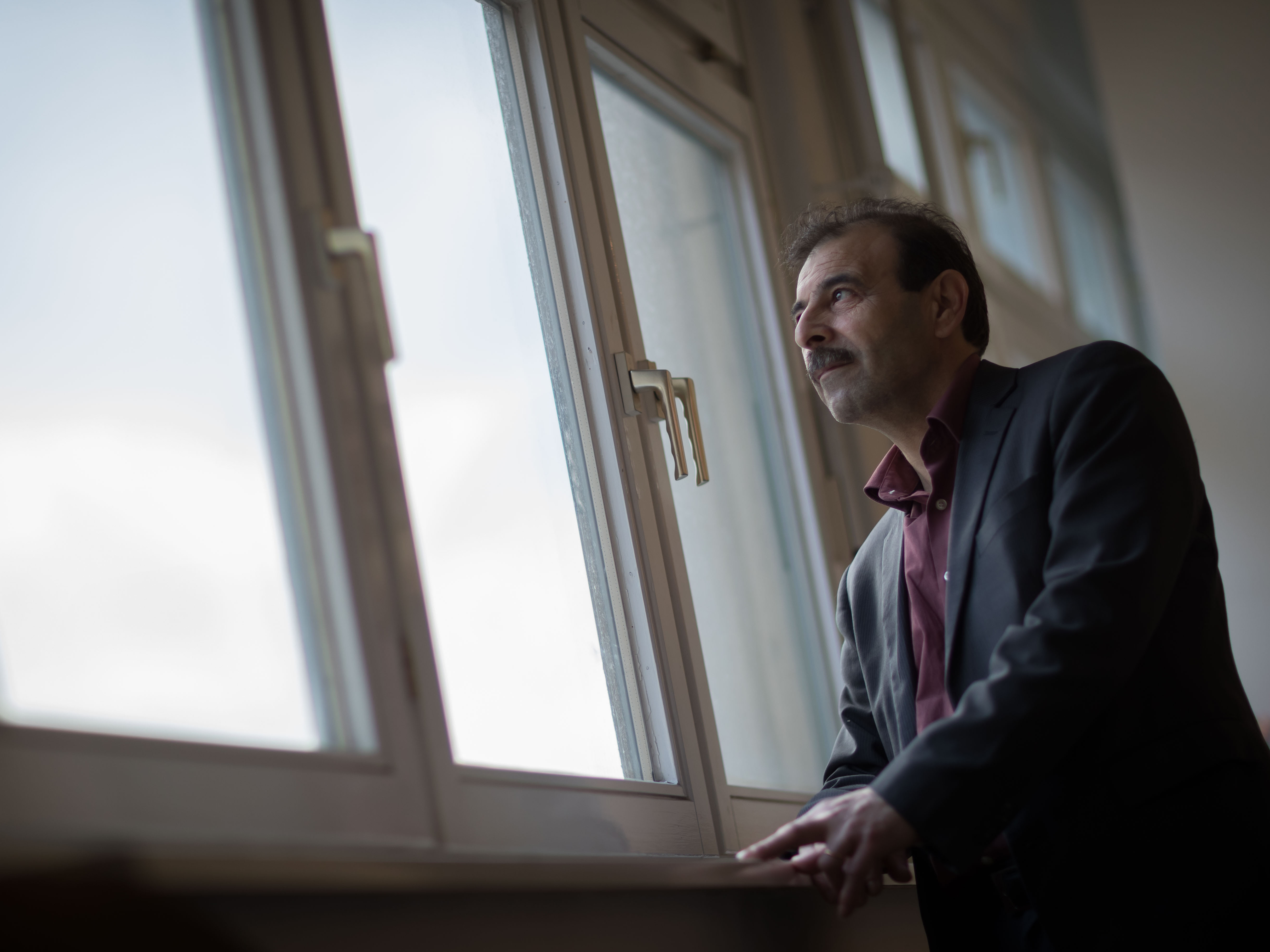 Syrian lawyer Anwar al-Bunni, who survived torture in Syrian regime jail cells, is pictured in Berlin on March 1, 2017. He is among other Syrian torture survivors, lawyers and human rights groups who have filed criminal complaints in Germany alleging crimes against humanity and war crimes committed by top officials in President Bashar Assad's regime. (AFP/Getty Images)