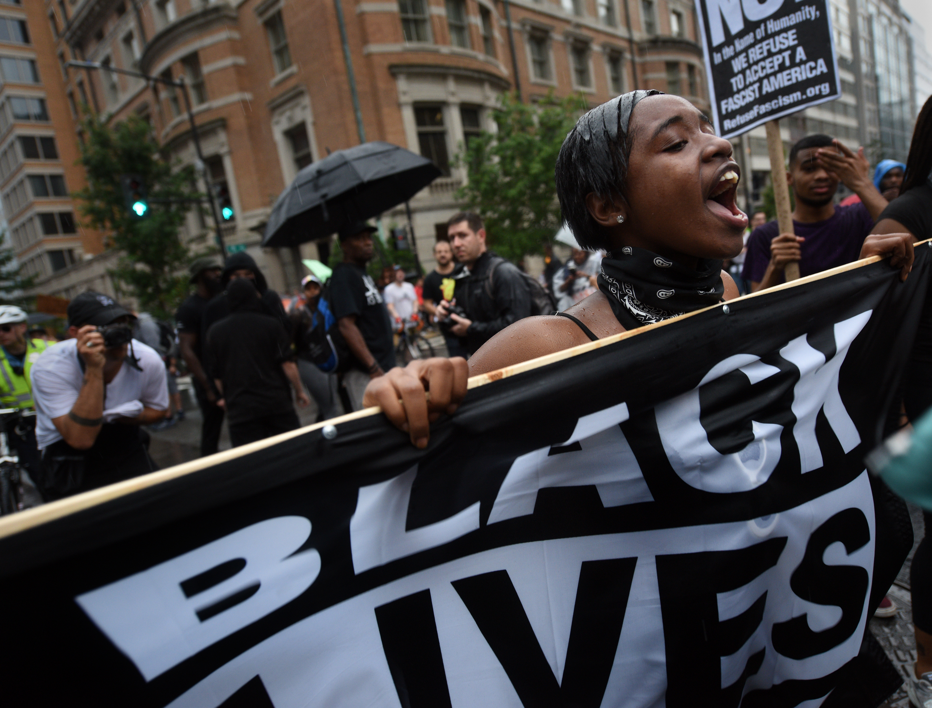 Counterprotesters stage a protest against right wing extremists' 'Unite The Right 2' rally. (Carol Guzy for NPR)