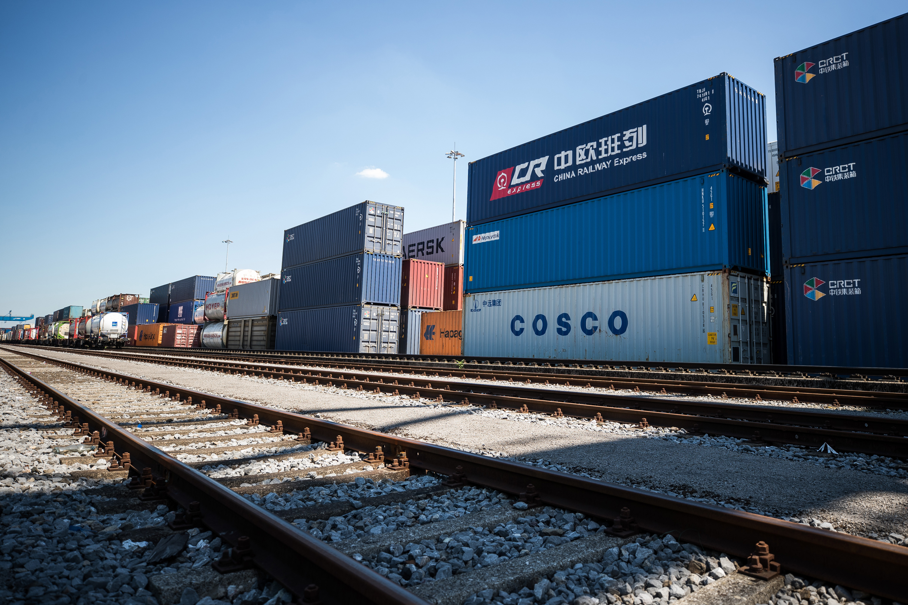 Containers from China are stacked next to the train station in the Duisburg port in July. Approximately 25 trains a week use a new connection between Duisburg and the Chinese cities of Chongqing and Yiwu. Several European countries use the railway for trading goods both from and into China. (Getty Images)