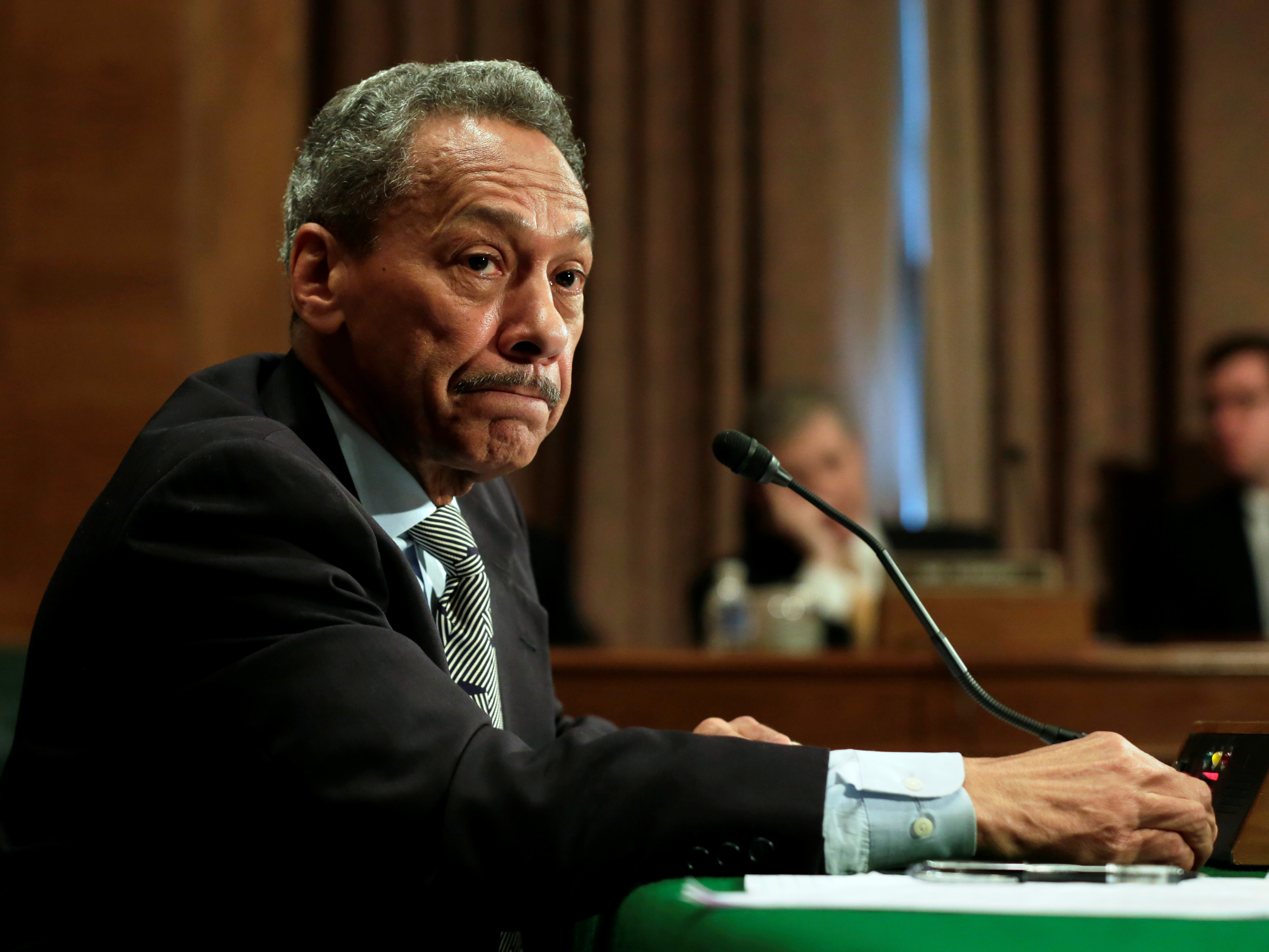Federal Housing Finance Agency Director Mel Watt testifies at a Senate banking committee hearing in May 2017. An employee says her secret recordings show that he held up her pay raise as he pressed her for a relationship. (Reuters)