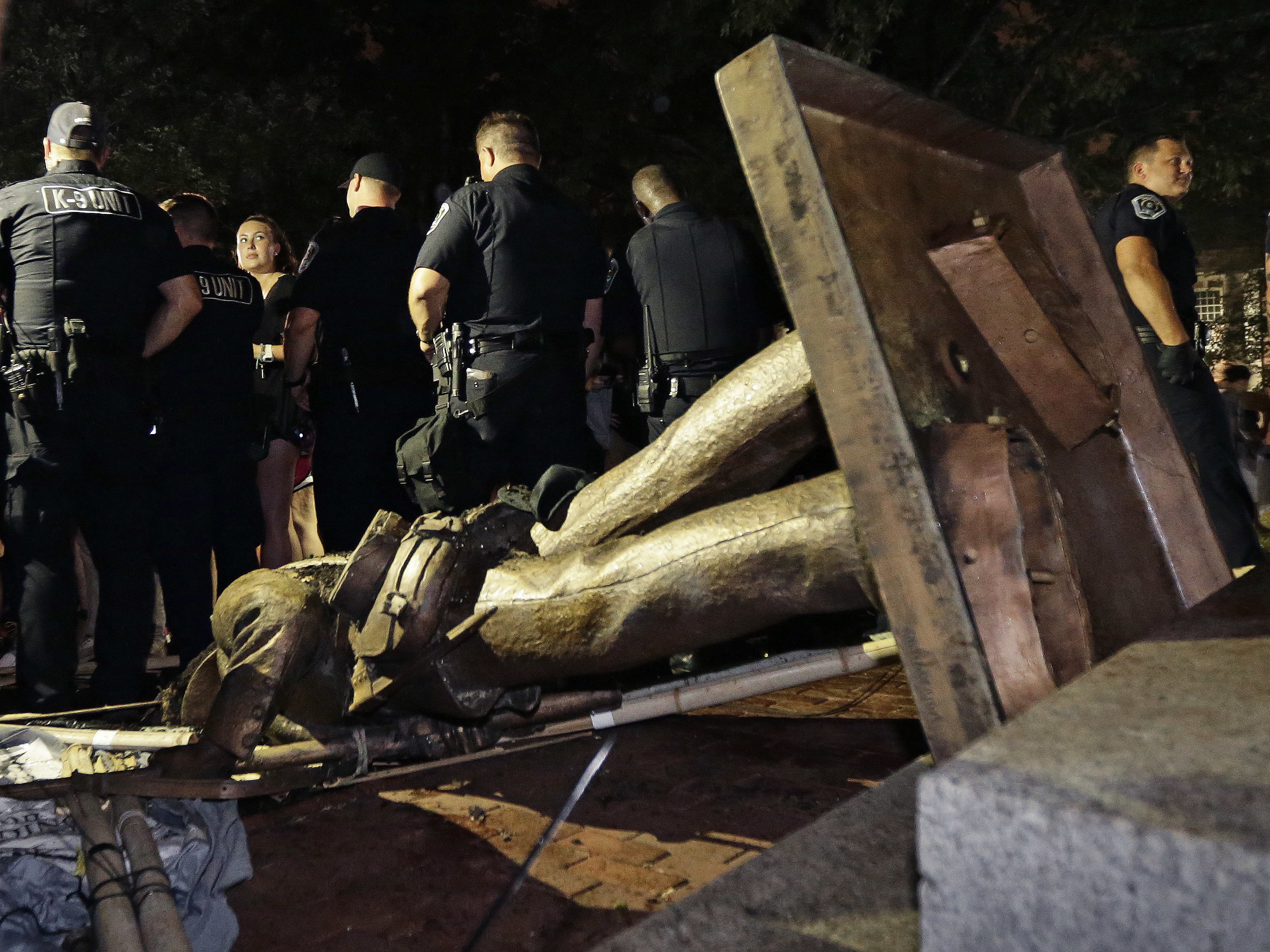 After a year of rising tensions, protesters tear down Confederate statue on UNC campus