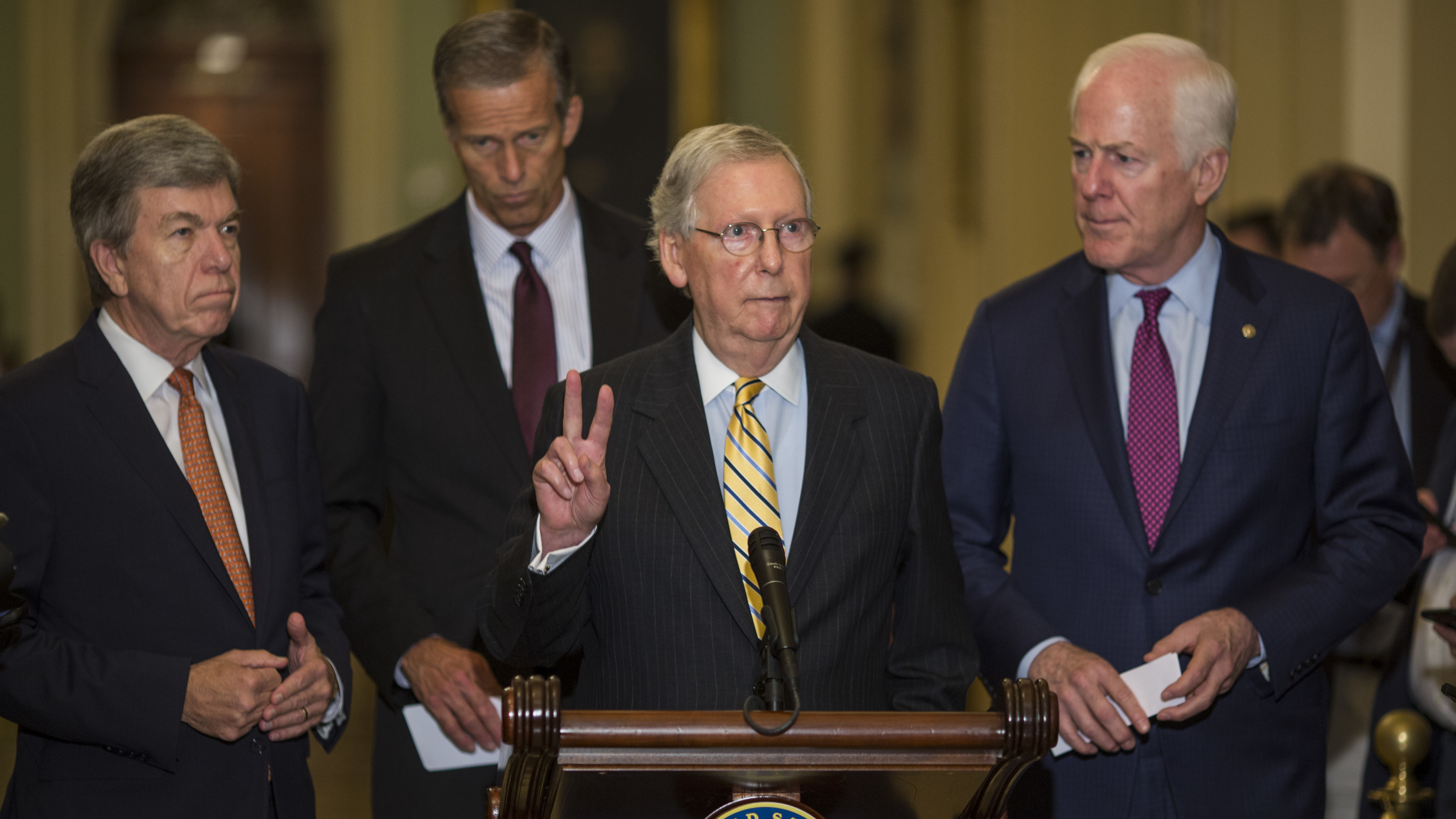 Senate Majority Leader Mitch McConnell spoke at a weekly news conference in Washington on Tuesday, the same day as double headlines about Paul Manafort and Michael Cohen — but McConnell declined to comment on their legal troubles. (Getty Images)