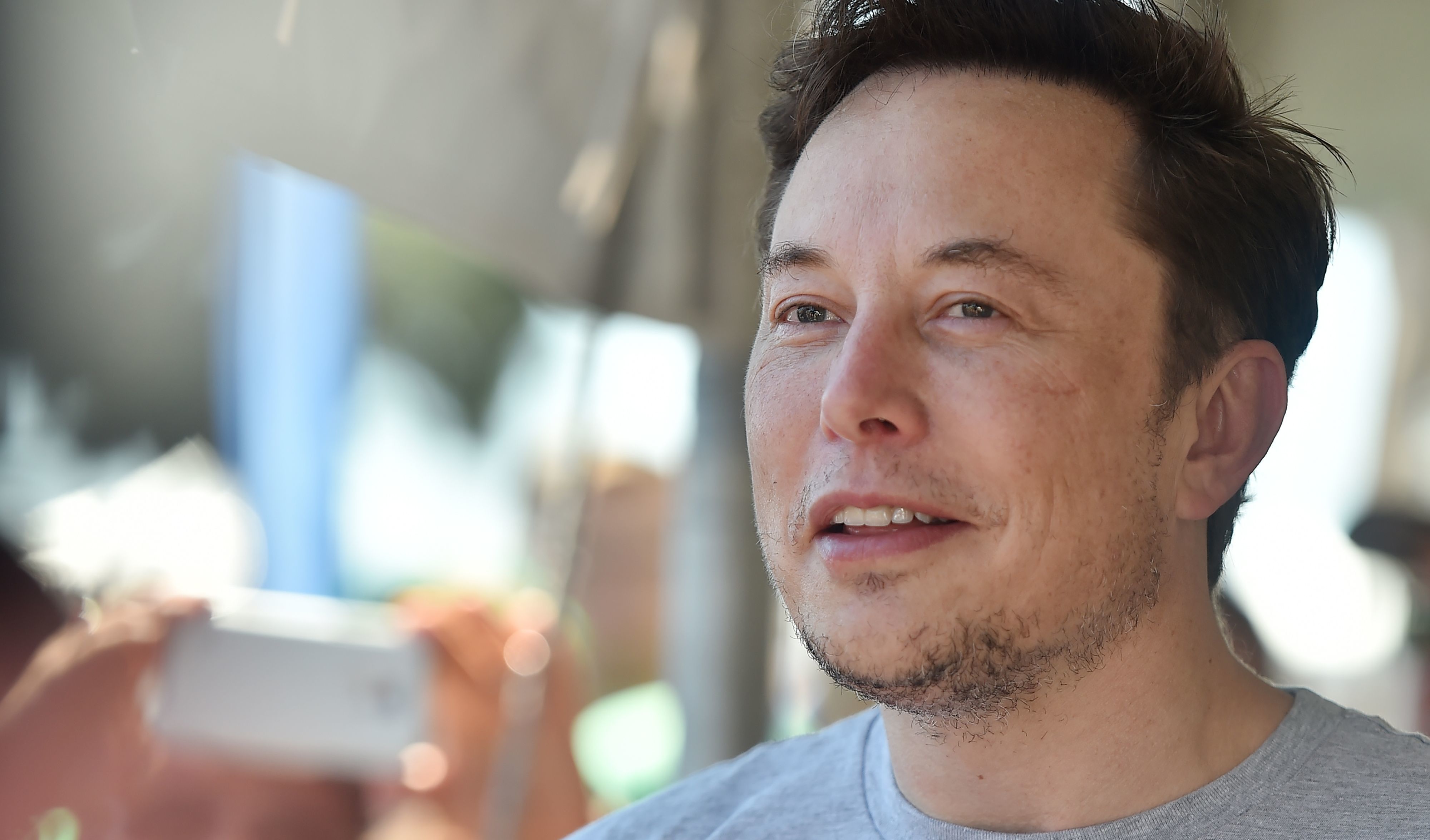 Elon Musk in Hawthorne, Calif., on July 22. He announced late Friday that Tesla would remain a publicly traded company.
