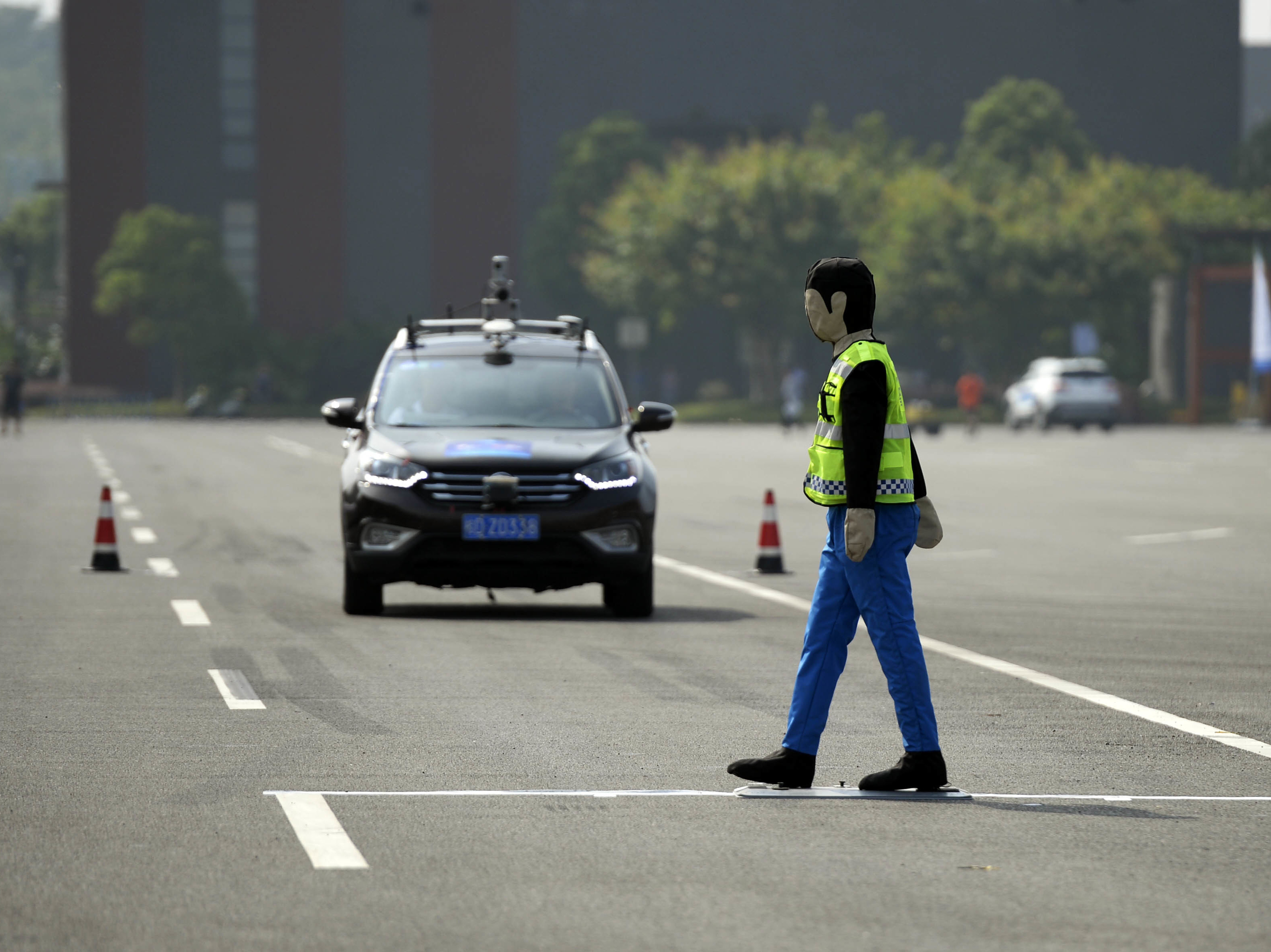 An unmanned automobile competes in the i-VISTA (Intelligent Vehicle Integrated Systems Test Area) Autonomous Driving Challenge on August 18 in Chongqing, China. (Getty)
