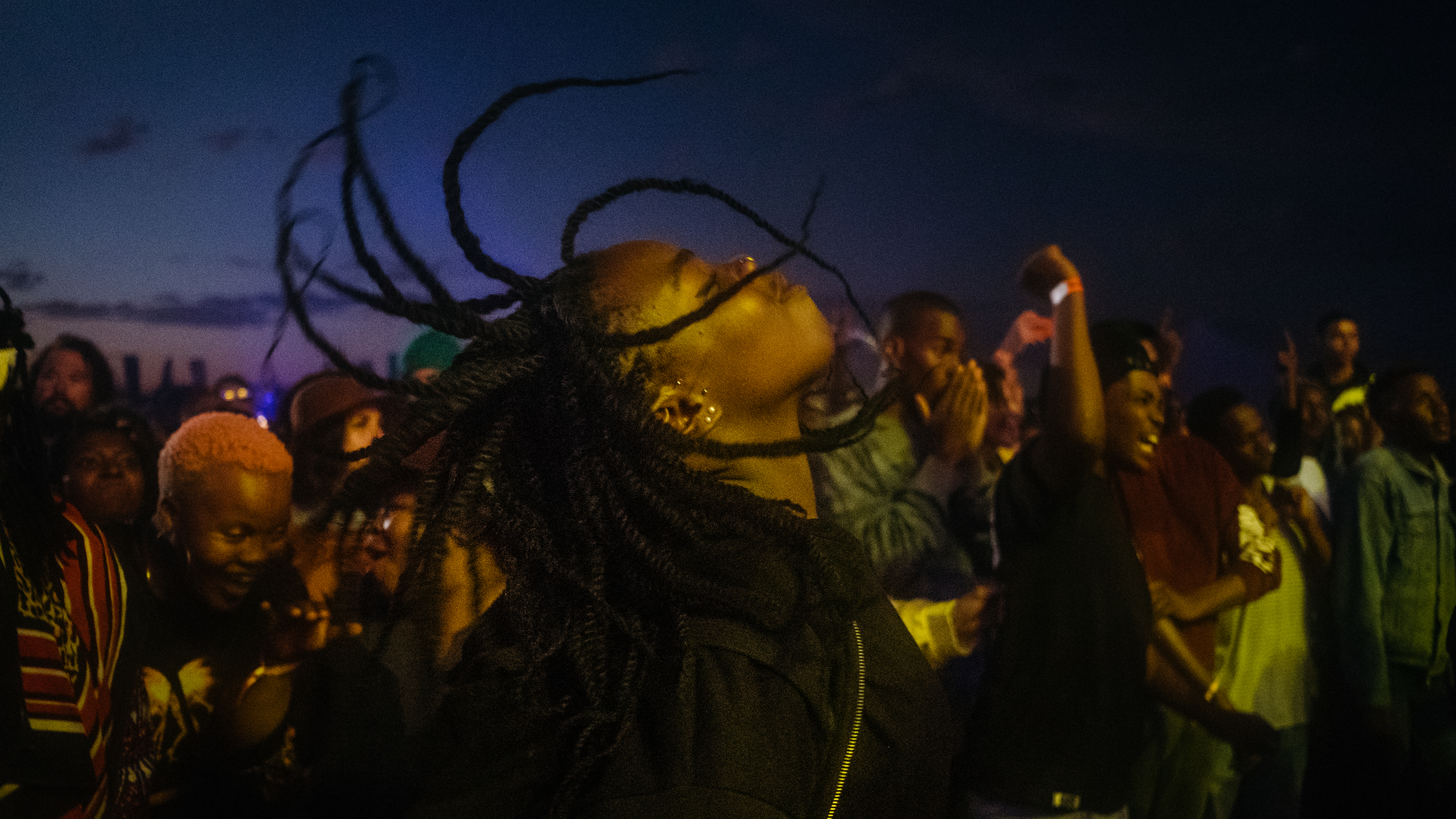 After hours of waiting, a festival attendee cuts loose in a mosh pit at the Afropunk Joburg festival in Johannesburg in December 2017.