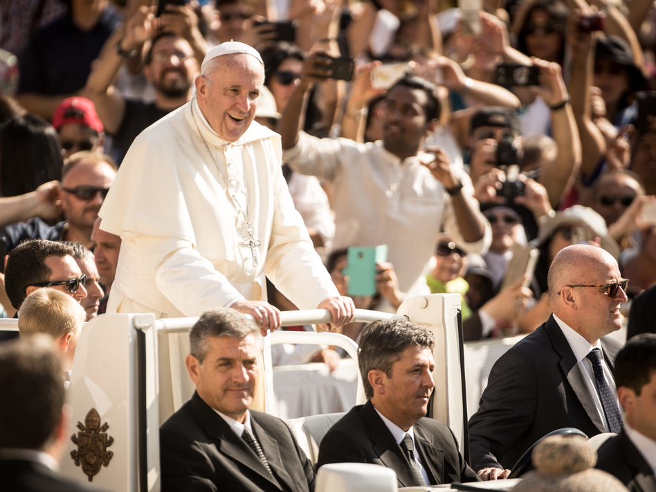 Pope Francis arrives for his weekly general audience in St. Peter's Square on Wednesday. (Giulio Origlia/Getty Images)
