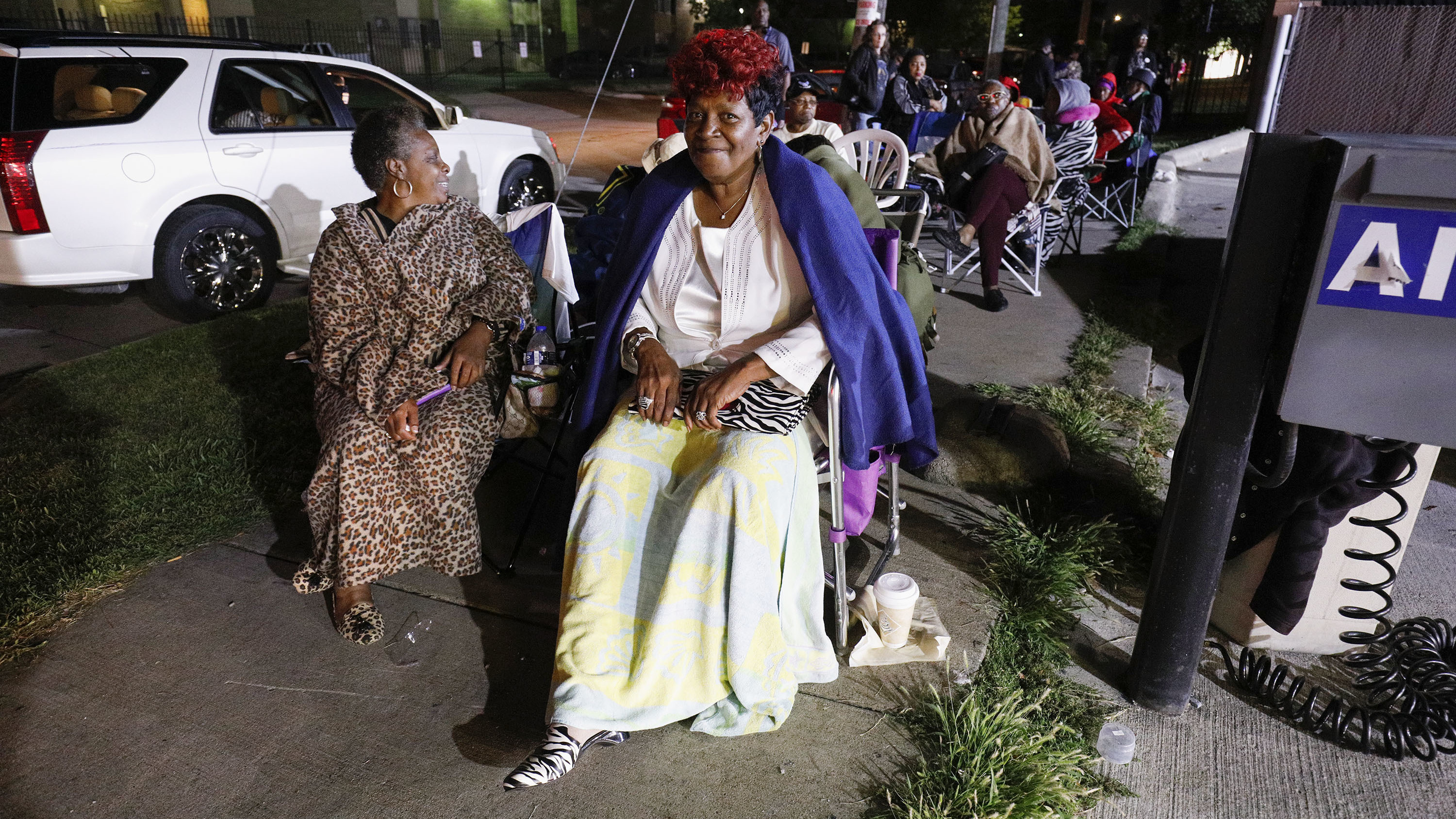 Aretha Franklin fans line up outside Greater Grace Temple at 2:30 a.m., hoping to be one of the thousand members of the general public allowed in to the singer