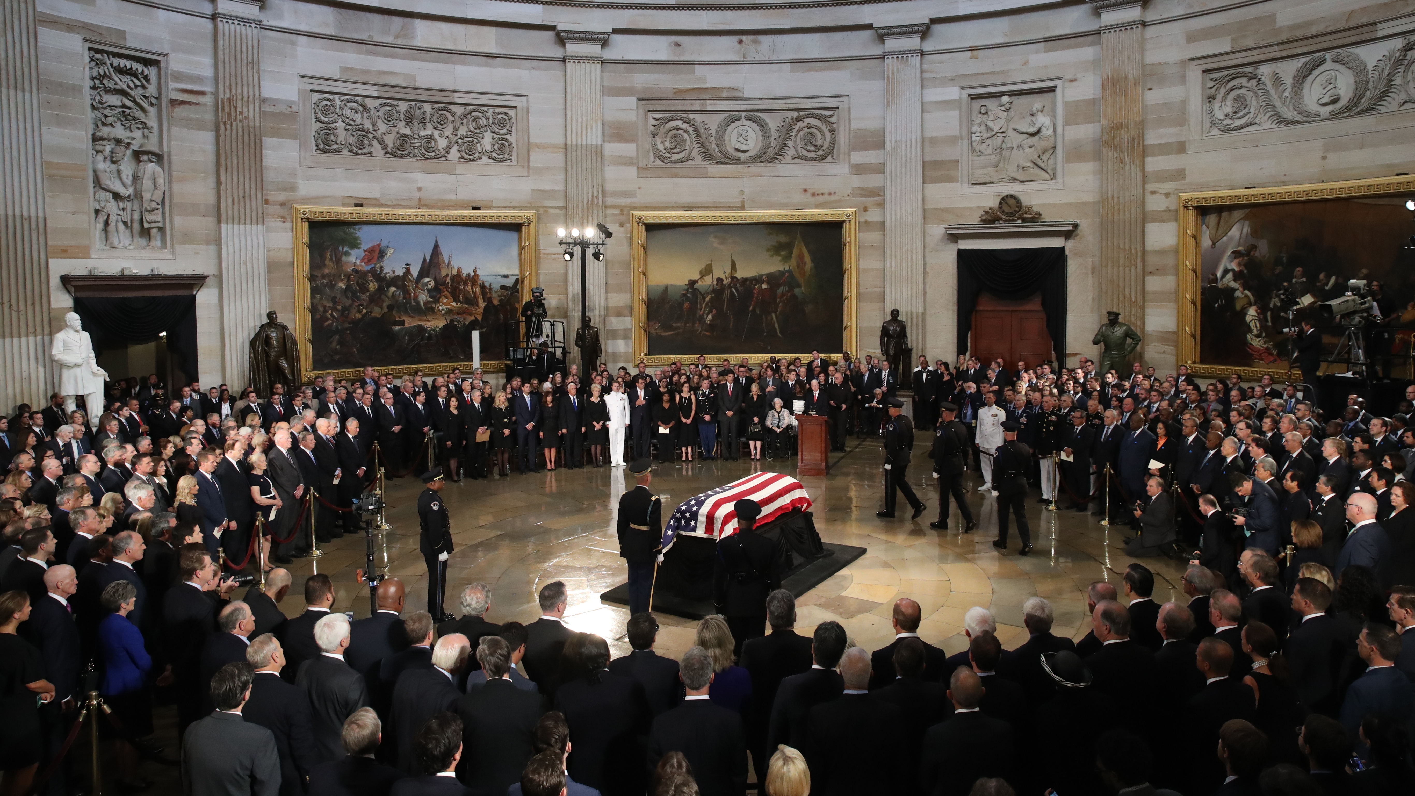 The flag-draped casket of Sen. John McCain arrives inside the Rotunda of the U.S. Capitol on Friday. (Getty Images)