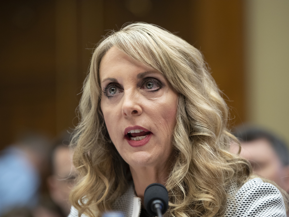 Kerry Perry, shown here testifying to lawmakers in May, has resigned from her post as USA Gymnastics President and CEO. (J. Scott Applewhite/AP)