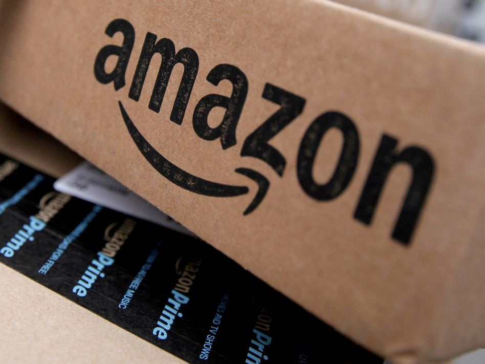 Amazon's stock value briefly crossed $1 trillion on Tuesday. The giant online retailer and Web services company has been consistently profitable since 2015. (Mike Segar/Reuters)