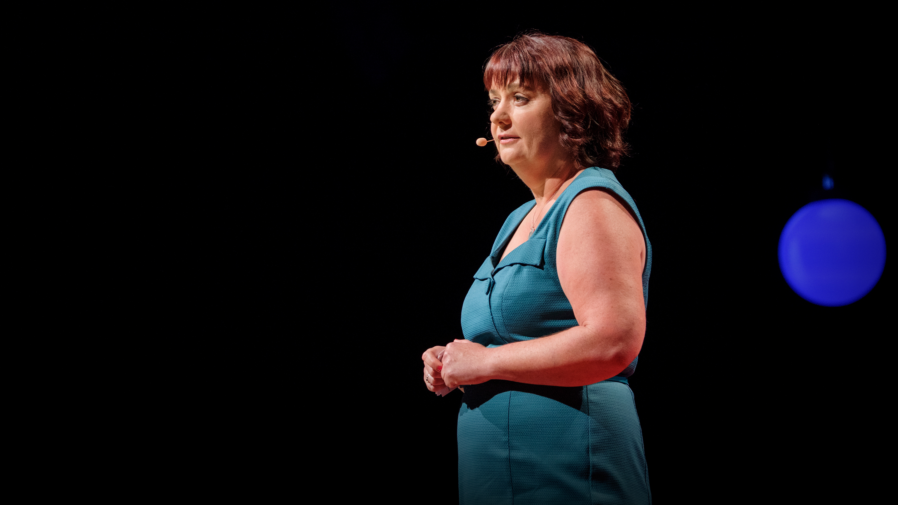 Michelle Knox on the TED stage.