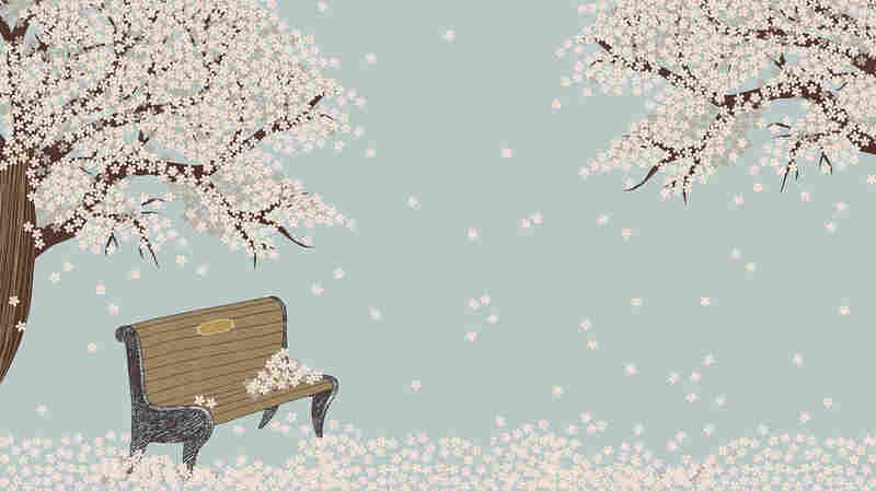 Bench and blooming tree artwork.