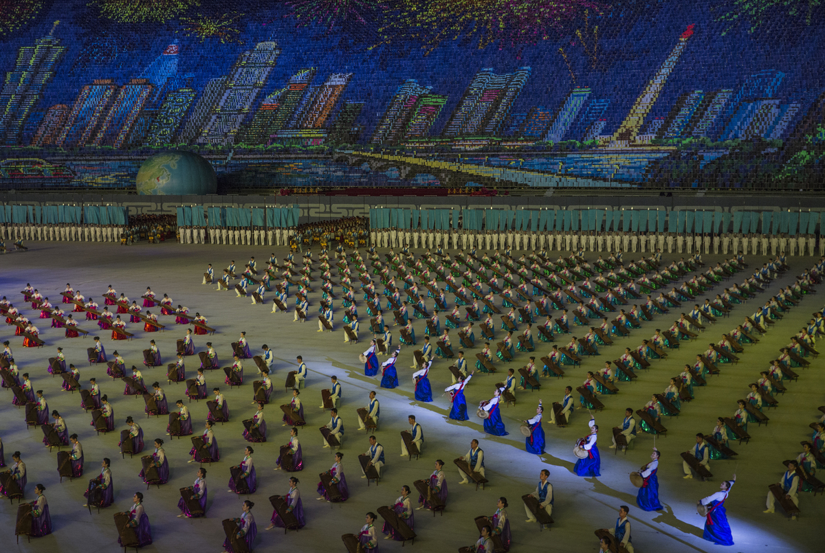 PHOTOS: North Korea Celebrates 70 Years With Military Parade And Mass