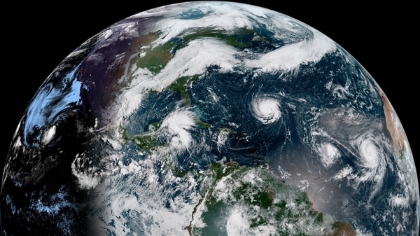 A satellite image from Monday, Sept. 10, shows Hurricane Florence as it travels west and gains strength in the Atlantic Ocean. Hurricanes Isaac and Helene have also formed off the coast of West Africa.