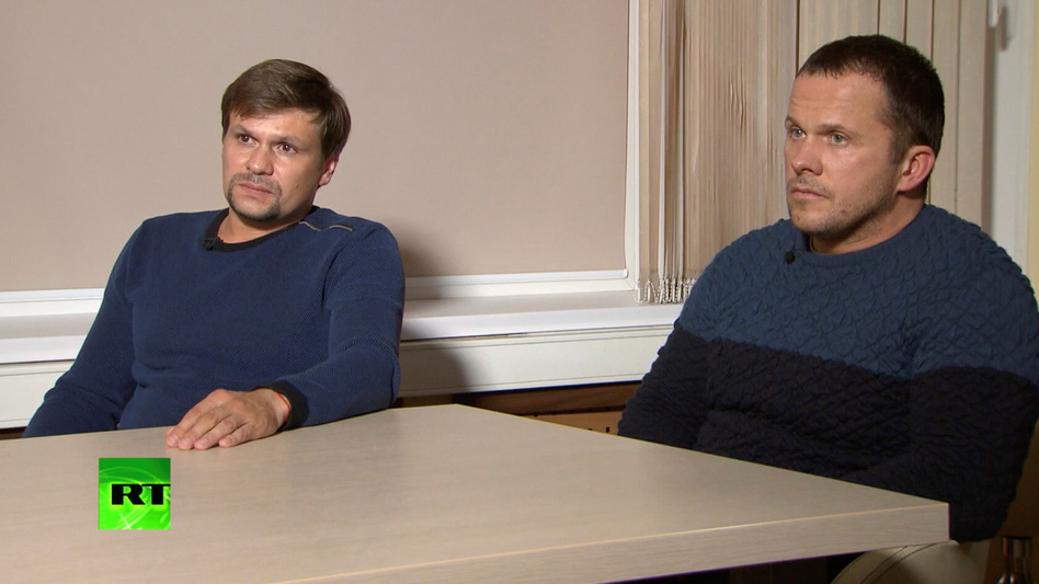 A still image taken from a video released by the RT TV shows two Russian men who say they are Ruslan Boshirov (left) and Alexander Petrov. British police accuse the pair of being intelligence officers who tried to kill former KGB spy Sergei Skripal. (RT via Reuters)