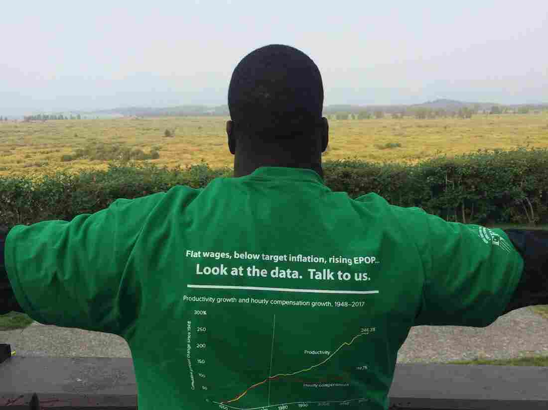 Members of Fed Up wear their opinions about monetary policy on their sleeves — or their T-shirts, at least.