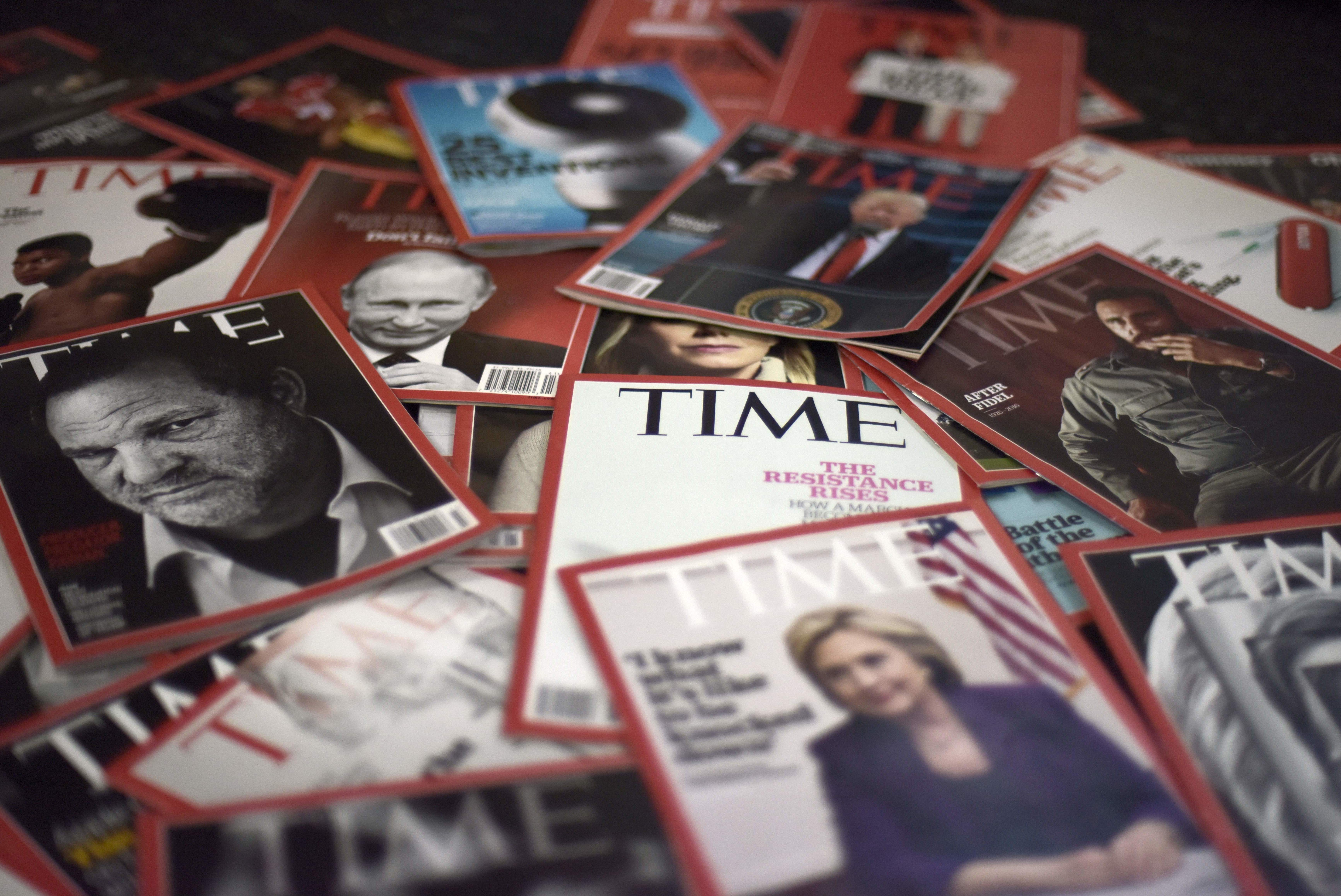 Almost eight months after Meredith finalized its purchase of Time Inc., the publishing giant says it reached a deal to sell <em>Time</em> magazine to tech billionaire Marc Benioff and his wife Lynne Benioff. (AFP via Getty Images)