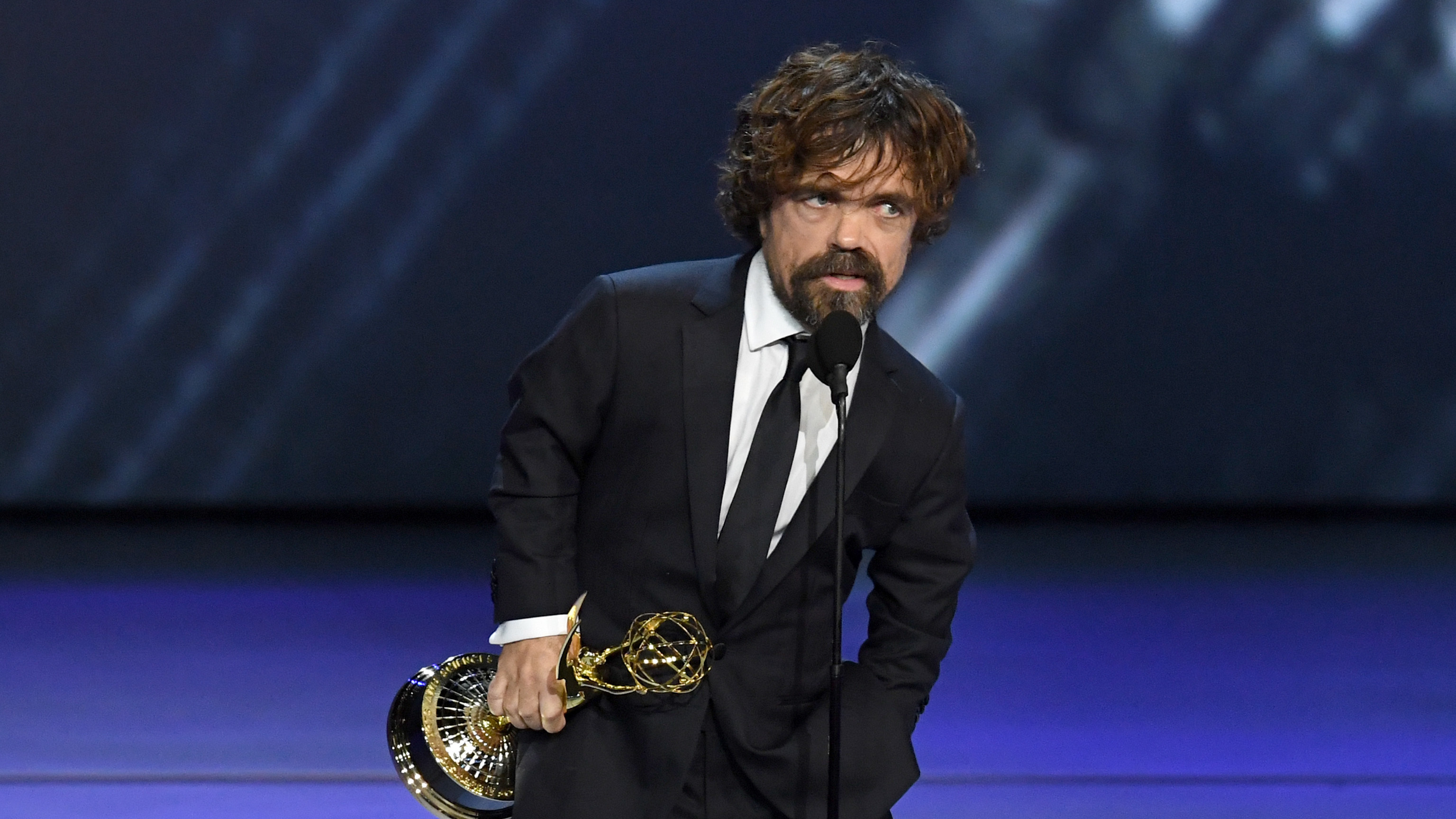 Peter Dinklage accepts the award for outstanding supporting actor in a drama for 