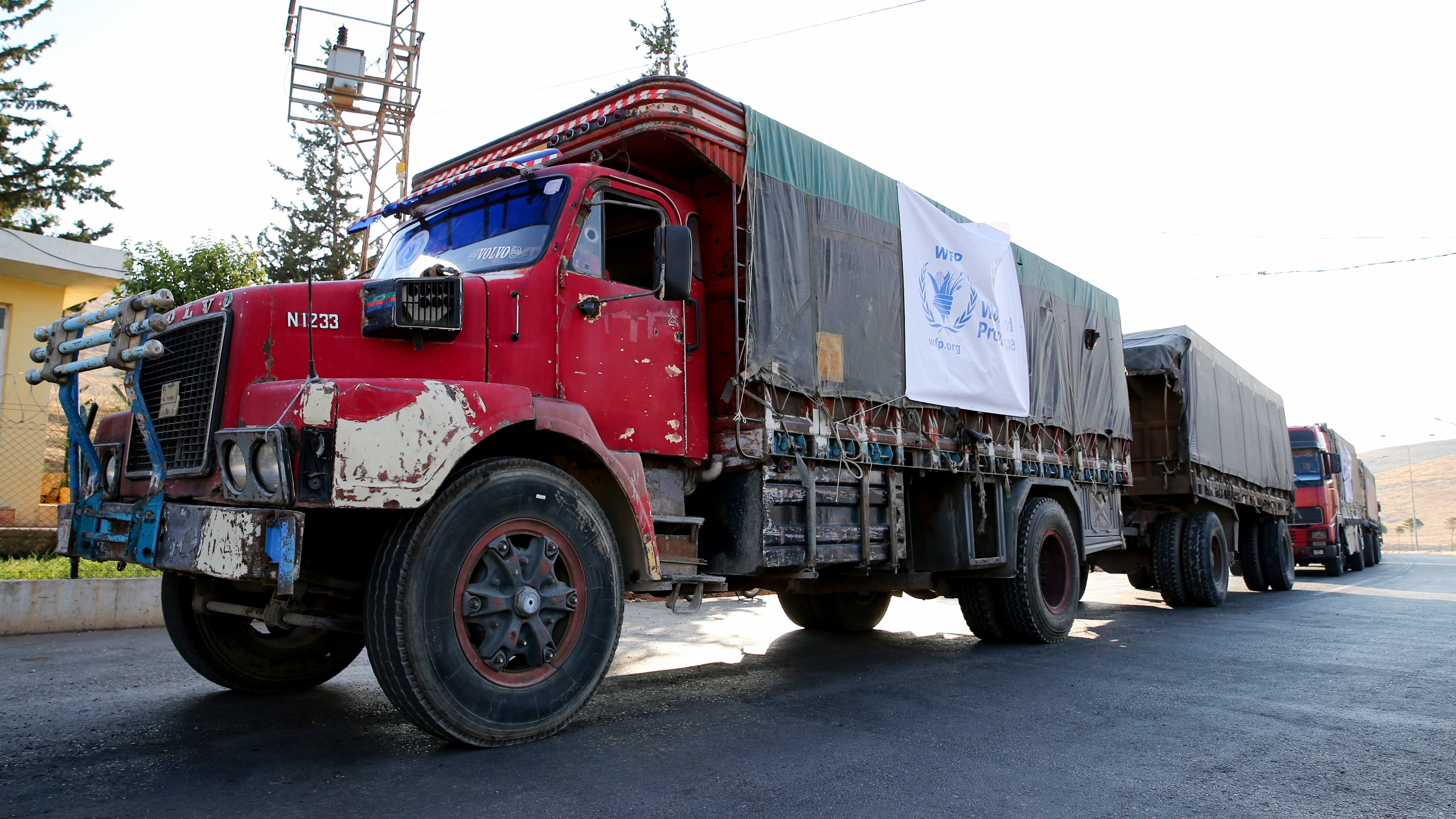A World Food Programme convoy carries humanitarian aid to Aleppo, Syria. Getting food into conflict zones is a major hurdle — and a topic of discussion at the WFP