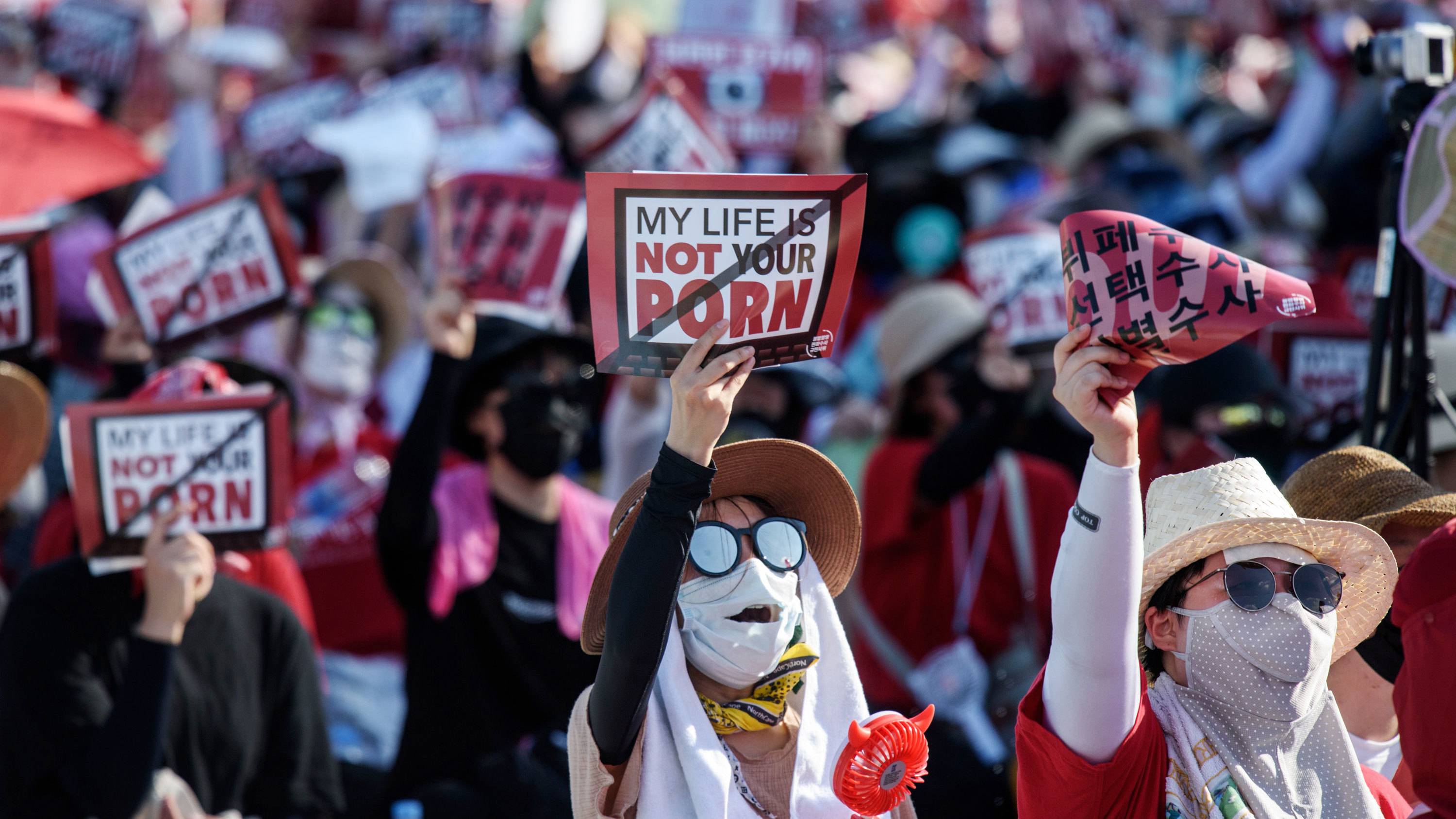 In August, some 70,000 women gathered in central Seoul, holding pickets saying, "My life is not your porn." It was the fourth protest this year condemning the prevalence of hidden camera crimes and the largest women-only rally in the country