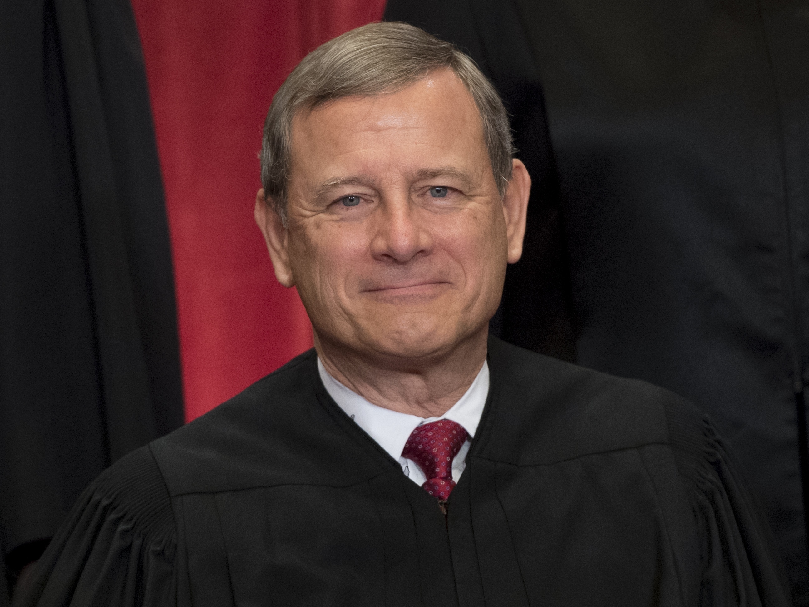 Chief Justice John G. Roberts had blocked a lower court order that would have required politically active nonprofits to disclose their donors. But on Tuesday the full Supreme Court overturned his stay. (AFP/Getty Images)