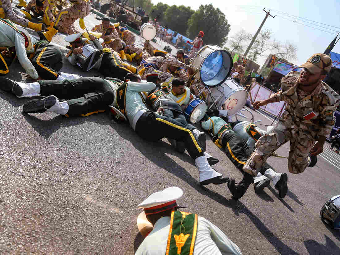 Iran vows vengeance for mass shooting at military parade that killed 25 Iran vows vengeance for mass shooting at military parade that killed 25