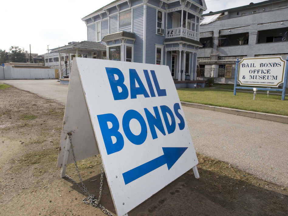 A bail bond office displays a sign near the Santa Ana Jail in Santa Ana, Calif. The most populous state in the nation passed a law to do away with money bail earlier this year. (Hector Mata/AP)