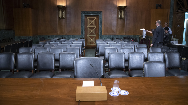 The Senate Judiciary Committee hearing room is prepared for Thursday's planned testimony from Christine Blasey Ford on Capitol Hill. (J. Scott Applewhite/AP)